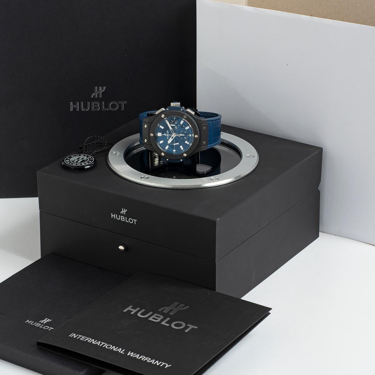 Our Hublot Big Bang Blue Chronograph ref 301.C1.7170.LR is instantly recognisable, featuring a micro-blasted ceramic 44mm case with screw-down crown, ceramic bezel and exhibition case back (showing the automatic HUB4100 movement) as well as a blue