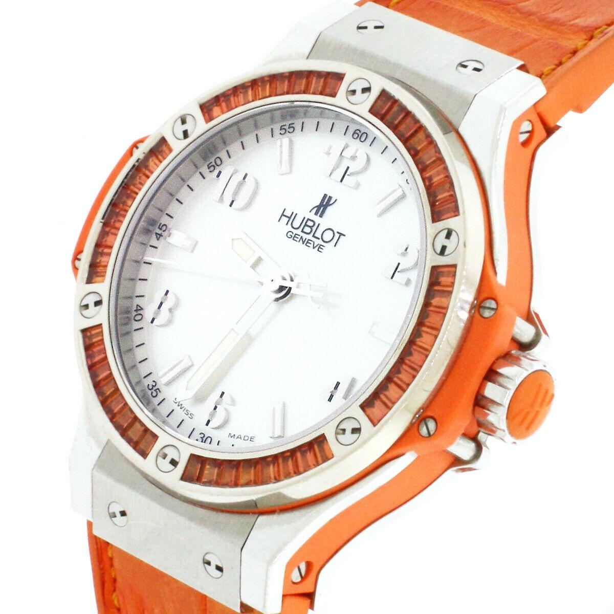 Hublot Big Bang tutti frutti steel women’s watch, Ref# 361.SO.6010.LR.1906. Quartz movement. Hublot white mother of pearl dial with arabic and stick hour markers. Stainless steel case of 38mm with orange baguette diamond bezel. Push-down crown.