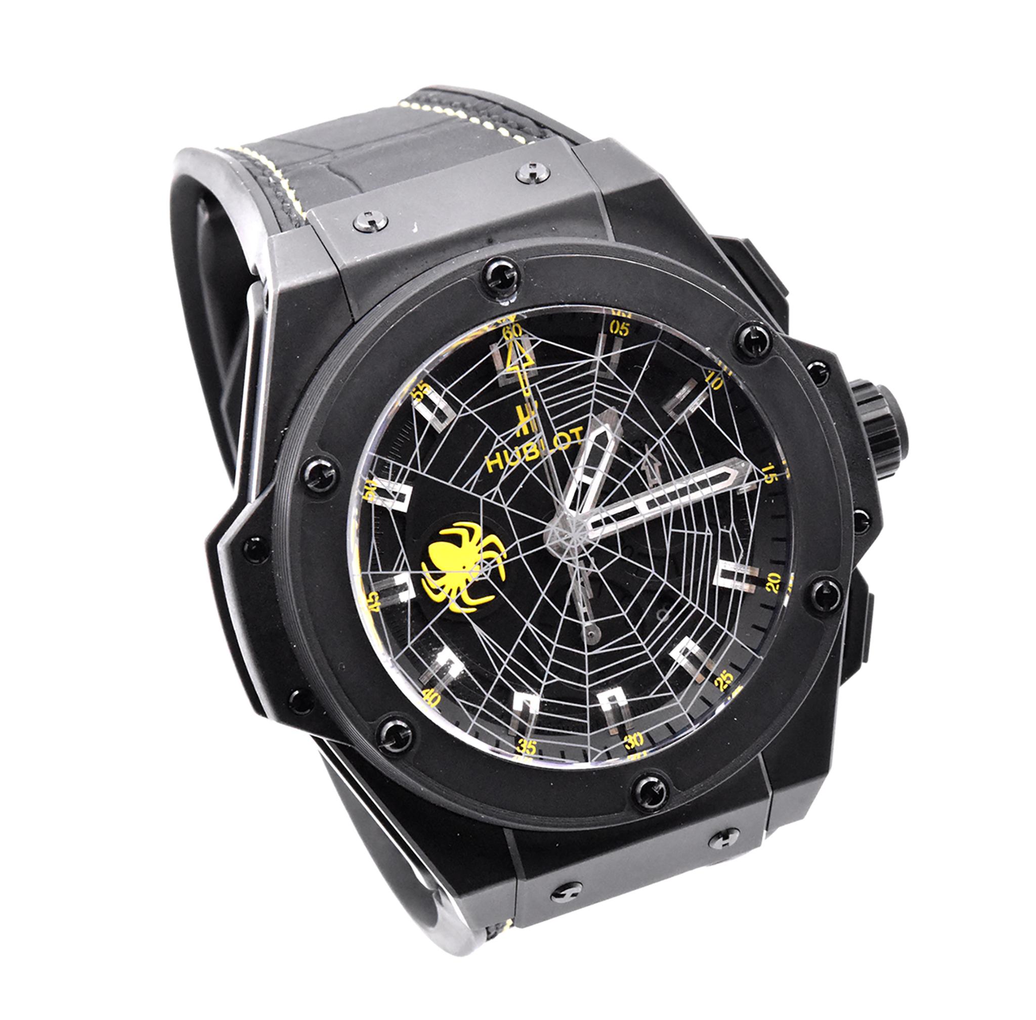 Movement: automatic 
Function: hours, minutes, sub seconds, date, chronograph
Case: 48mm black ceramic case, sapphire spider web crystal, exhibition case back, 
Band: black rubber Hublot strap with locking deployment clasp
Dial: black spider, spider