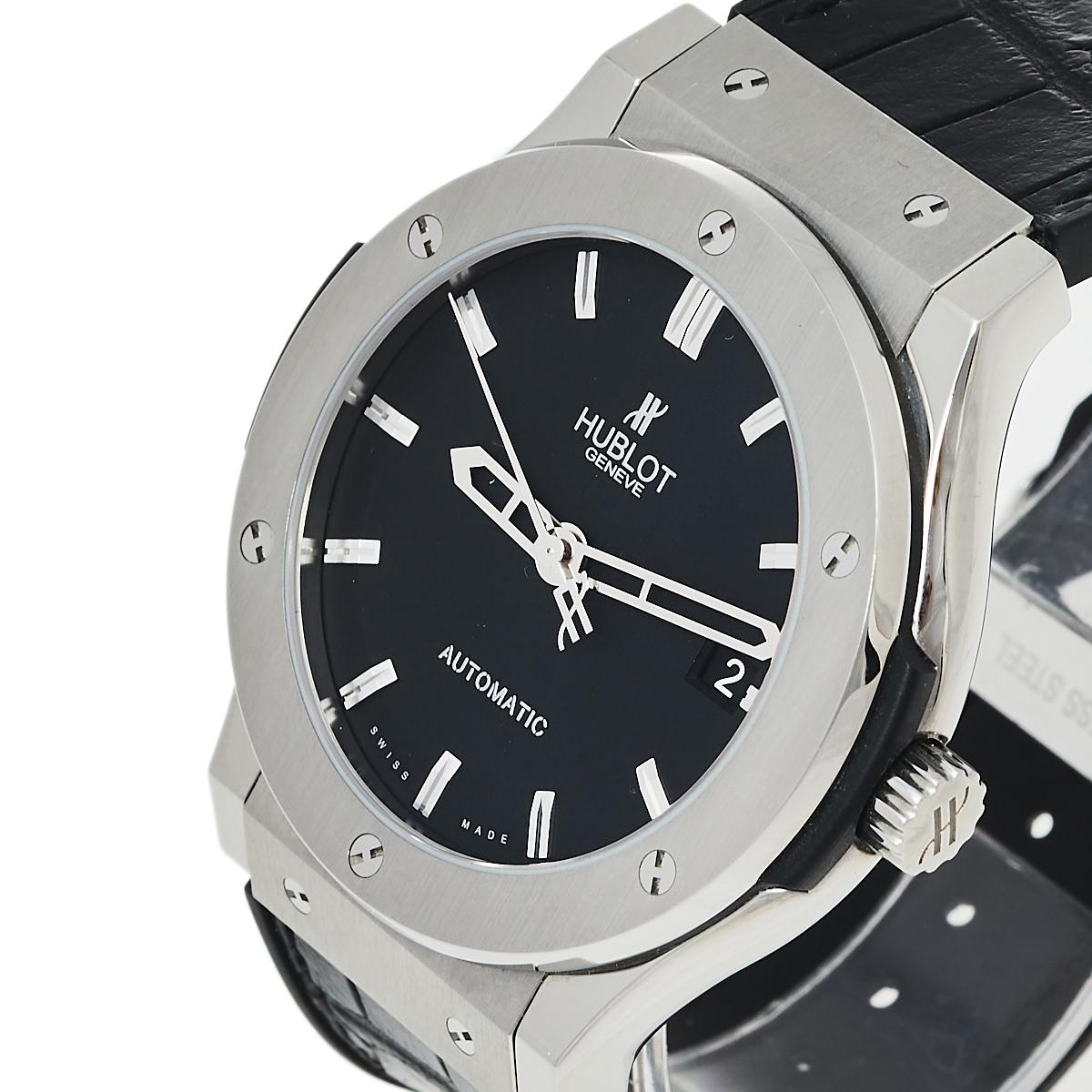 Not only is this stylish Hublot Classic Fusion wristwatch comfortable to wear, but it’s also well-crafted and attractive. The titanium case with a punctuated bezel surrounding a black dial on a tonal strap looks elegantly timeless. Its impressive