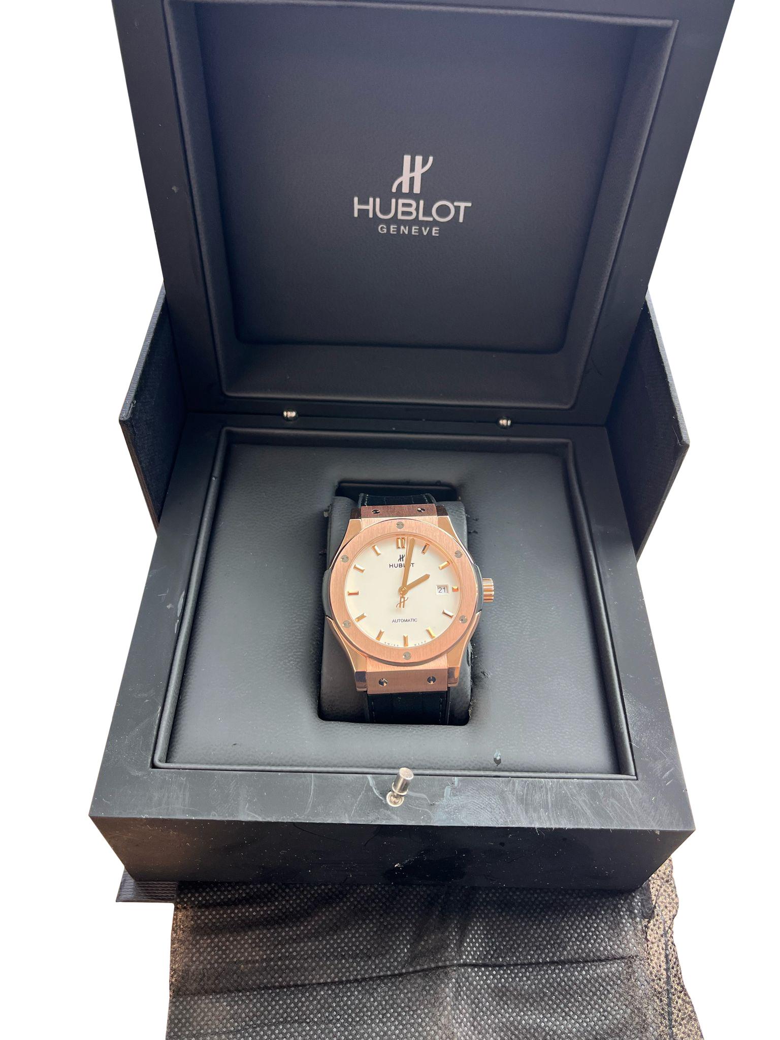 Stunning Hublot Classic Fusion 42 King Gold Opalin Silver/White Dial on Black Hublot Alligator Strap! Arrives with original Hublot box! Striking piece and a significant bang for your buck, the watch’s mix of brushed and polished King Gold finishes