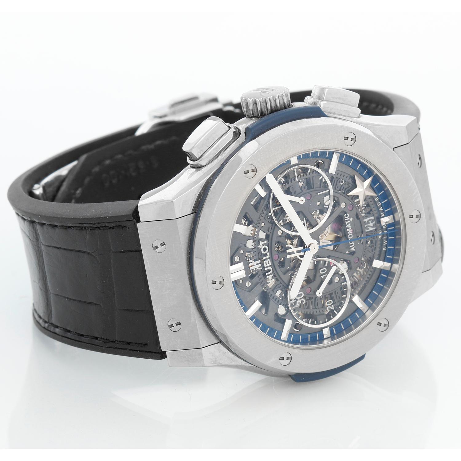 Hublot Classic Fusion Dallas Cowboys Special Edition Men's Watch 525.NX.0179.LR.DCW14 - Automatic winding, chronograph. Polished titanium with satin finish ( 45 mm ). Skeleton dial with rhodium counter ring. Dallas Cowboys Start at 5 o'clock. Black