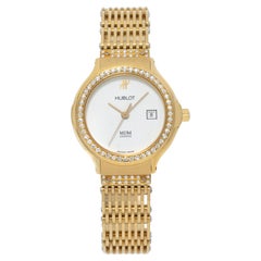 Hublot M D M 1391.3 054 inYellow Gold with a White dial 28mm Quartz watch