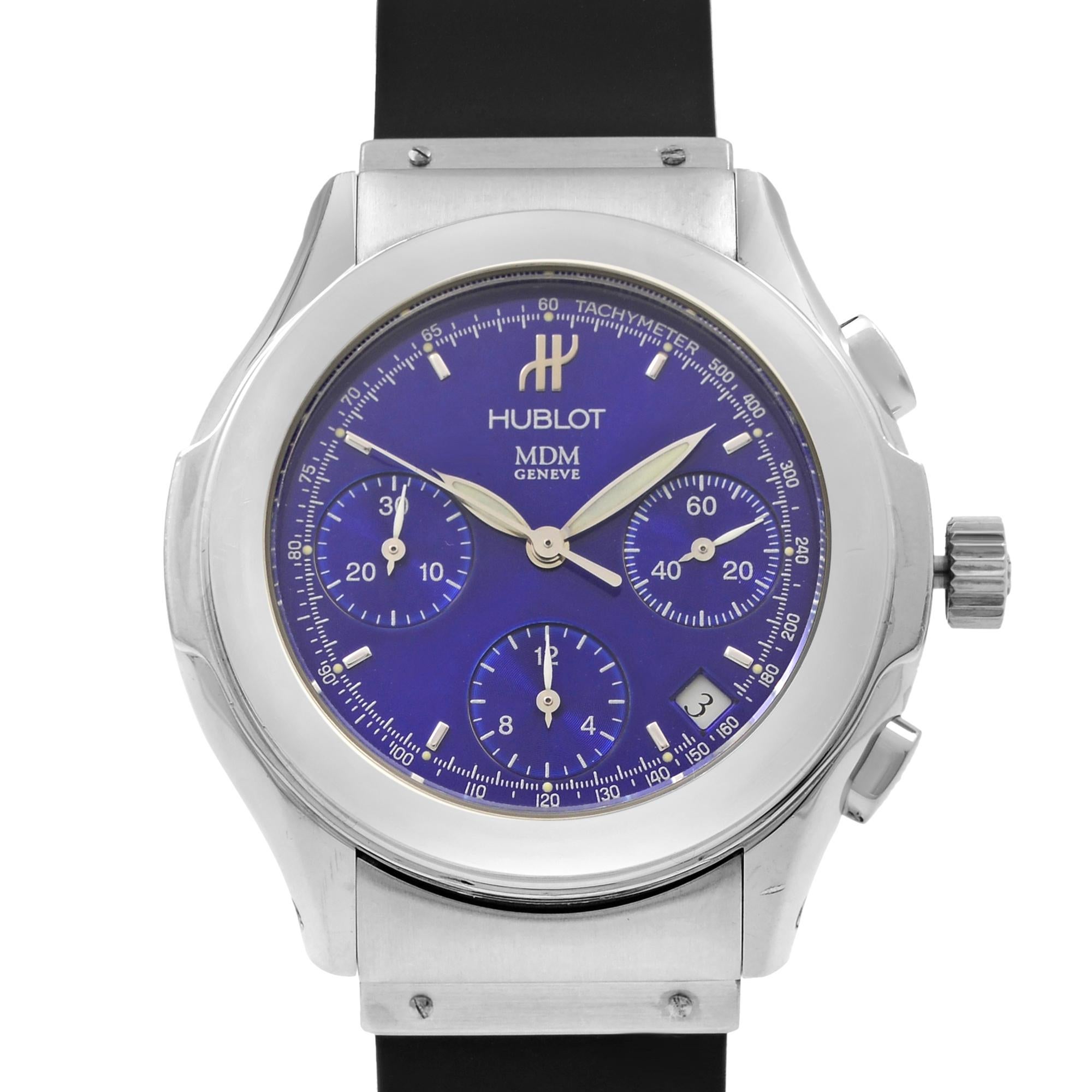 This pre-owned Hublot MDM 1810.10 is a beautiful men's timepiece that is powered by mechanical (automatic) movement which is cased in a stainless steel case. It has a round shape face, chronograph, date indicator, small seconds subdial, tachymeter