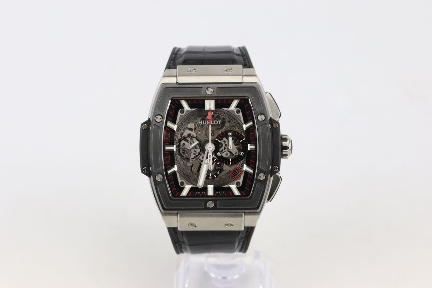 Hublot Spirit of Big Bang titanium ceramic 45mm wrist watch. This ’Spirit of Big Bang’ 45mm watch by Hublot has been crafted at the brand's Swiss atelier from titanium with an intricate automatic movement and has a black dial and finished with a