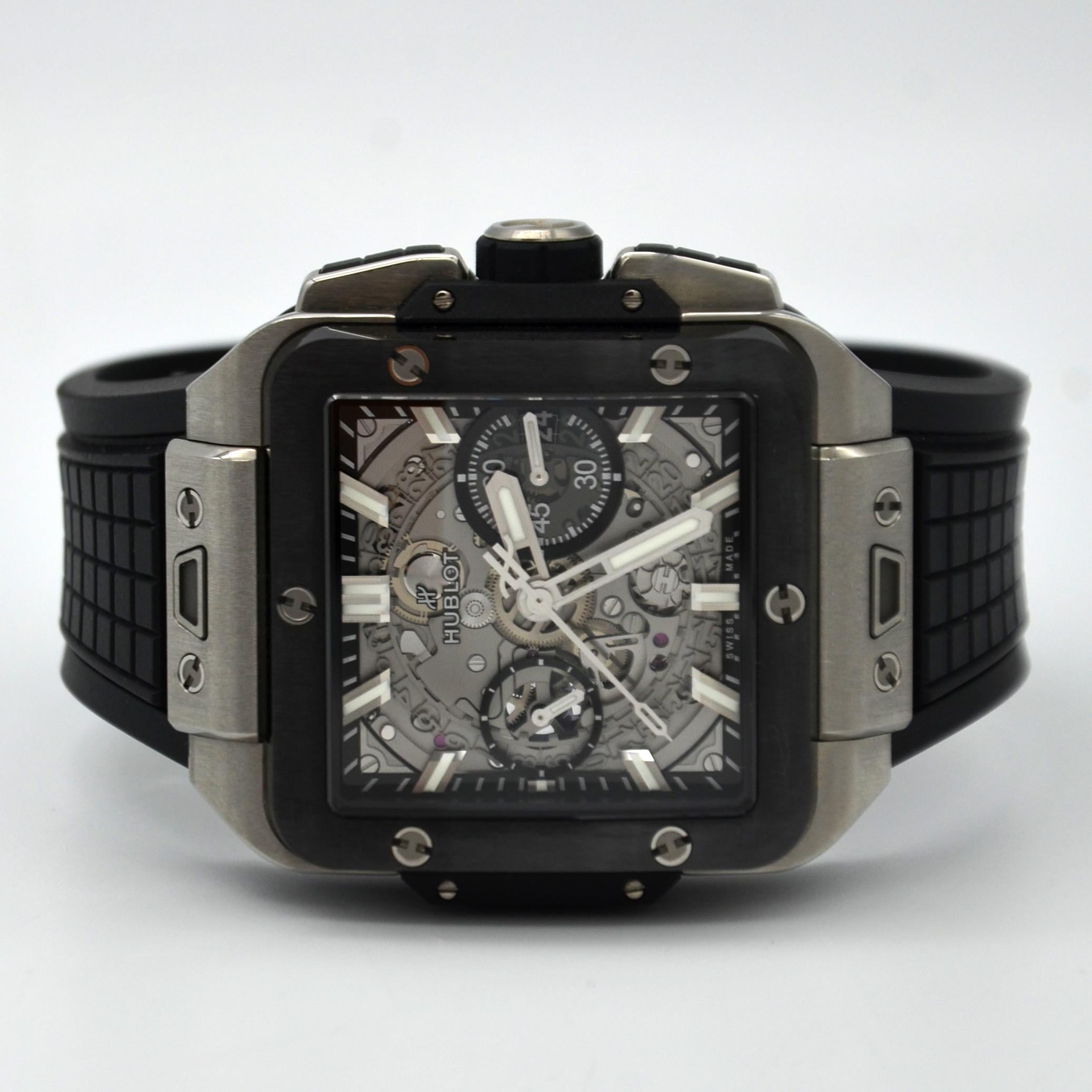 Hublot Square Bang Unico Titanium Ceramic Watch - 42 mm - Sapphire Crystal Dial - Black Structured Rubber Strap

42 mm satin-finished and polished titanium case, satin-finished and polished black ceramic bezel with 6 h-shaped titanium screws,