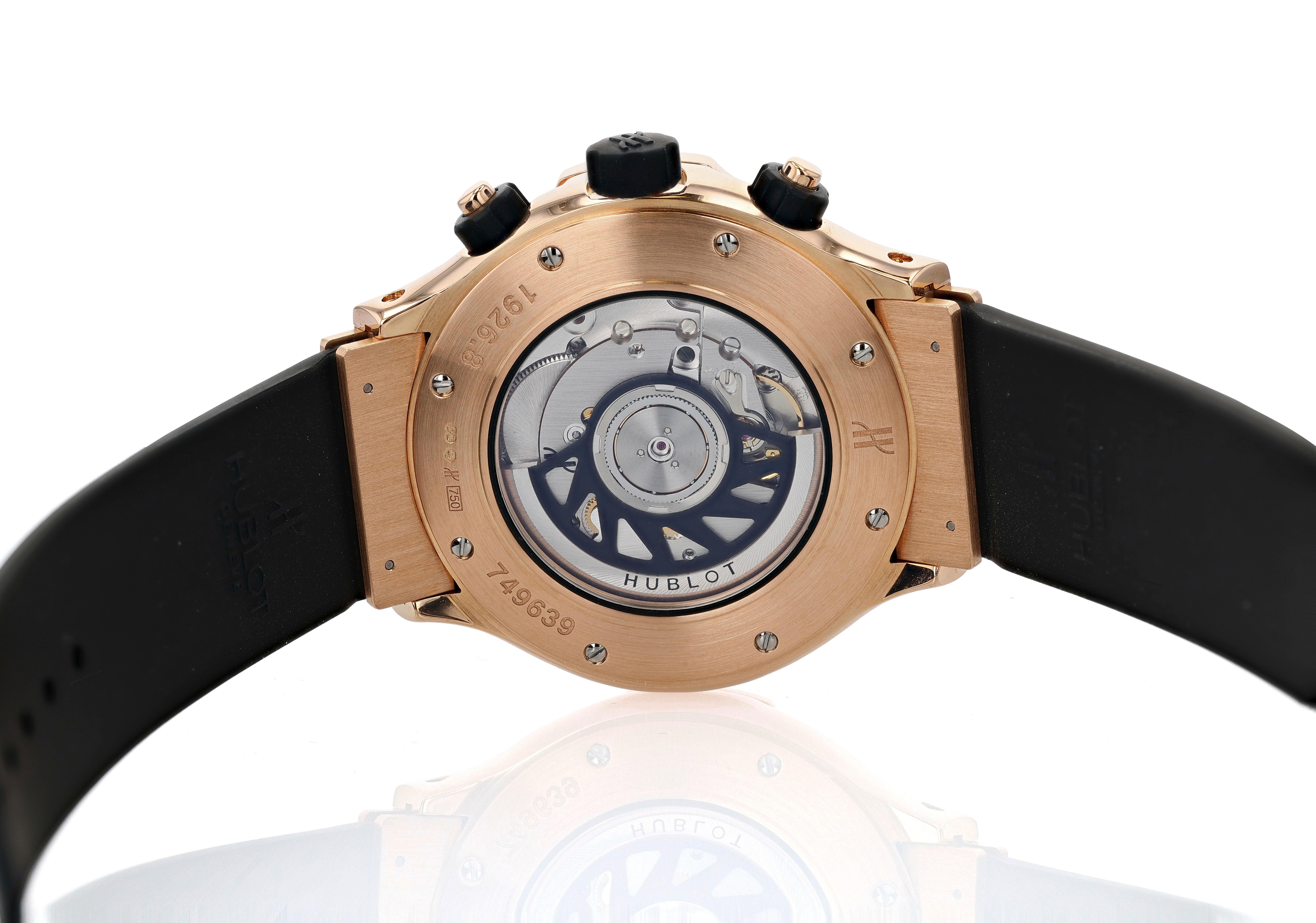 An 18 karat rose gold 42mm Hublot Super B Flyback Chronograph wristwatch featuring a black dial. The watch is mounted on a rubber strap for versatility and light weight performance. The automatic movement, 1926.8.NL30, can be seen through an