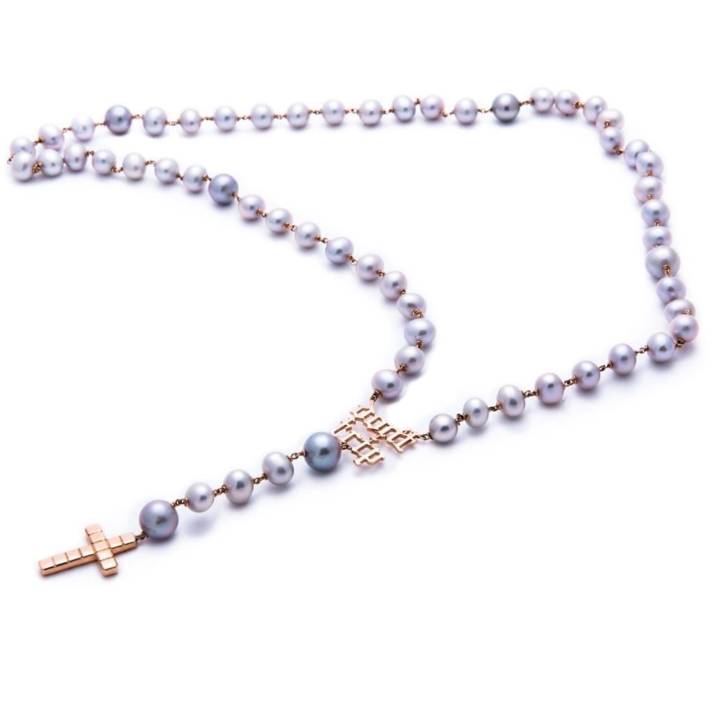 Huckleberry Ltd handmade 18k gold rosary with 72 natural grey Tahitian pearls, 18k rose gold Don't Trip mantra and 18k gold xanax cross.

Measurements: 27