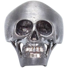 Huckleberry Ltd black silver Skull ring with white diamond baguette teeth