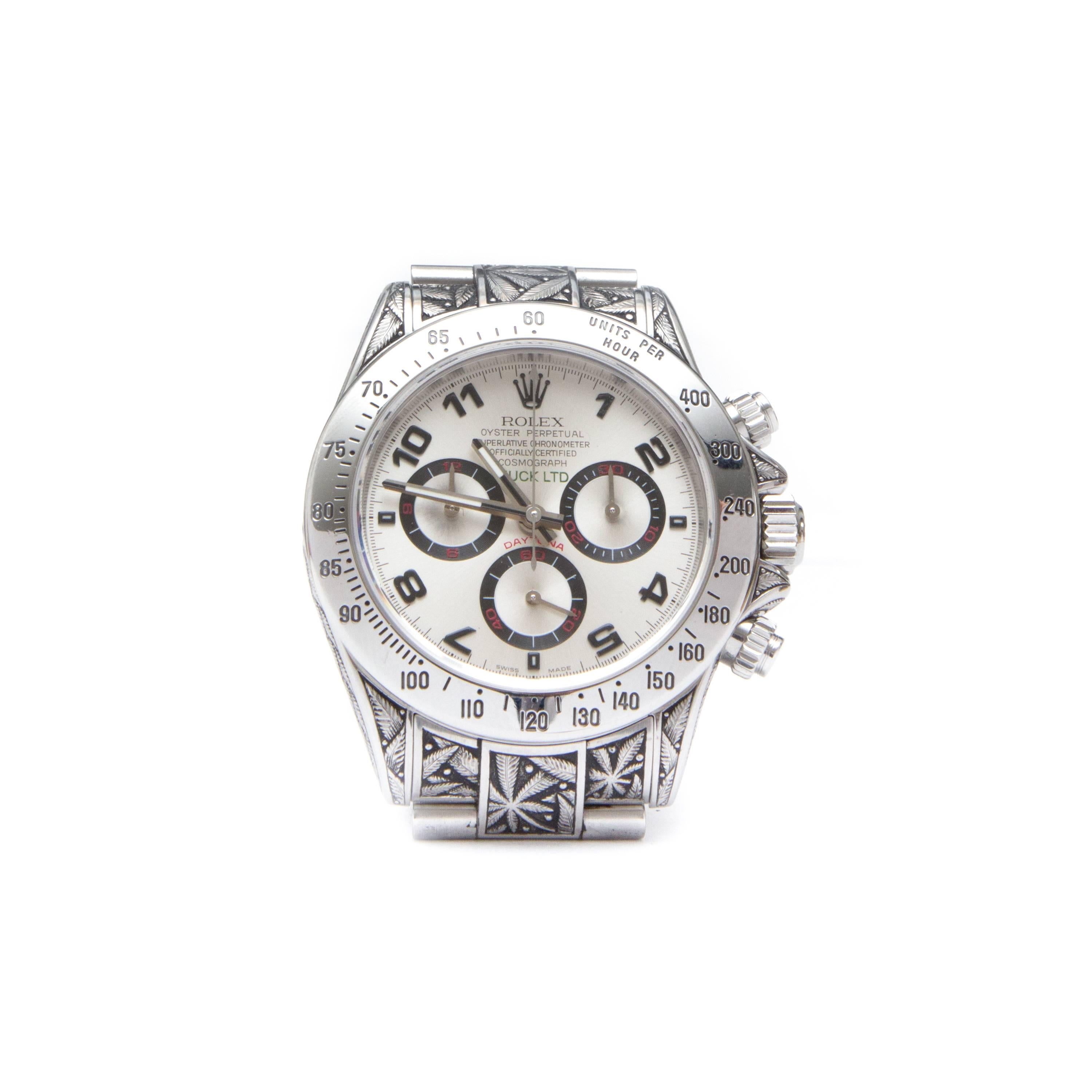 **This item is made-to-order with a 6-8 week lead time**

Huckleberry Ltd engraved stainless steel Rolex Daytona with Mary Jane motif, silver dial, suede lined wooden box and lifetime warrantee.