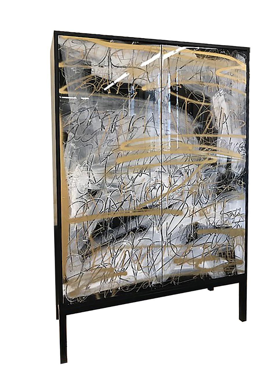 The Hudson Cabinet is designed and finished in our Toronto studio, Morgan Clayhall. The artwork on the doors is created by Murray Duncan

Due to the unique process of creating the artwork and that the client can supply us with words that are