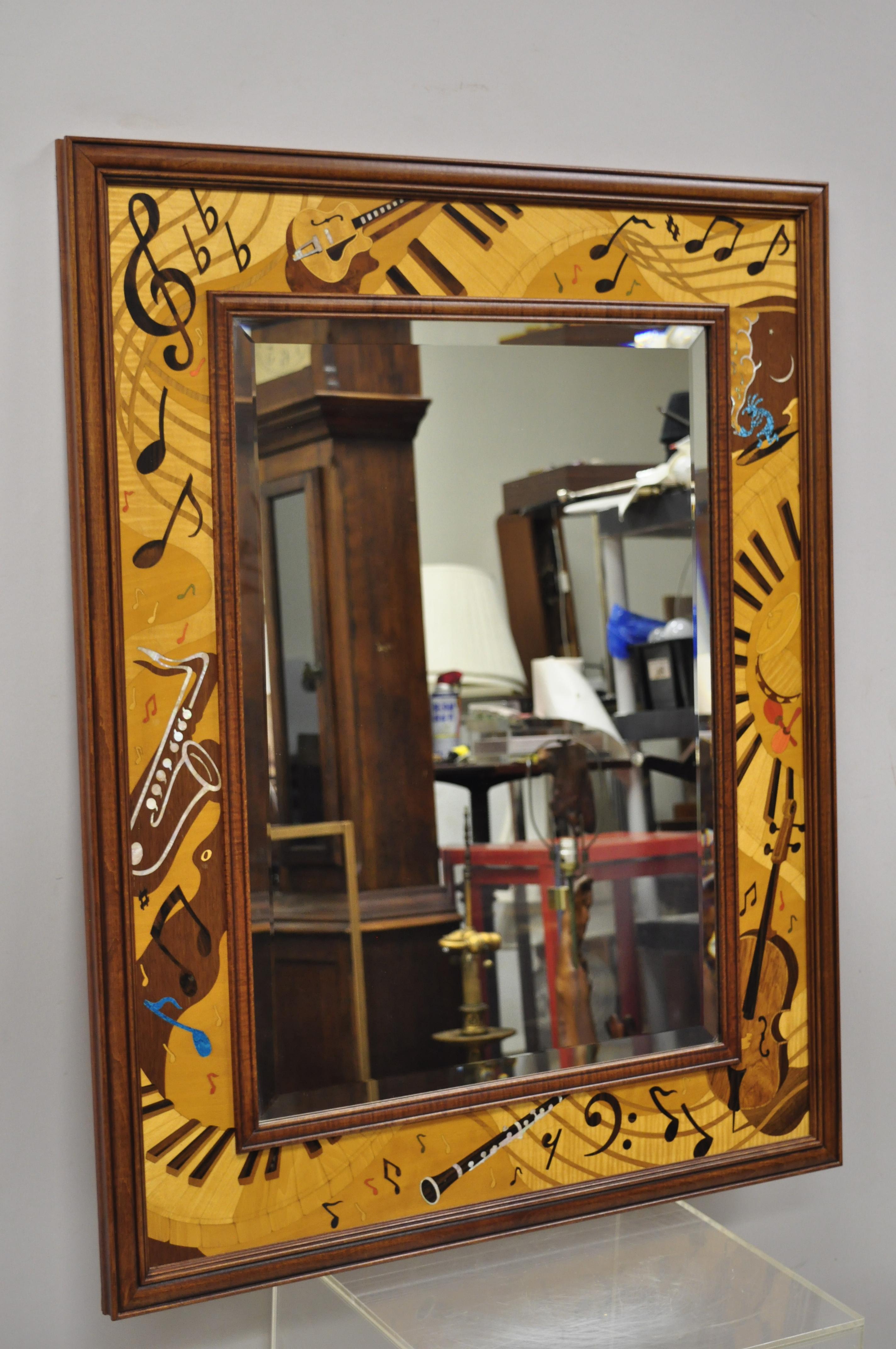Hudson River inlay Marquetry inlaid Jammin' large border beveled glass mirror. Item features multiple wood inlays and mother of pearl, all done by hand. Beveled glass mirror, solid wood frame, beautiful wood grain, quality craftsmanship, great style