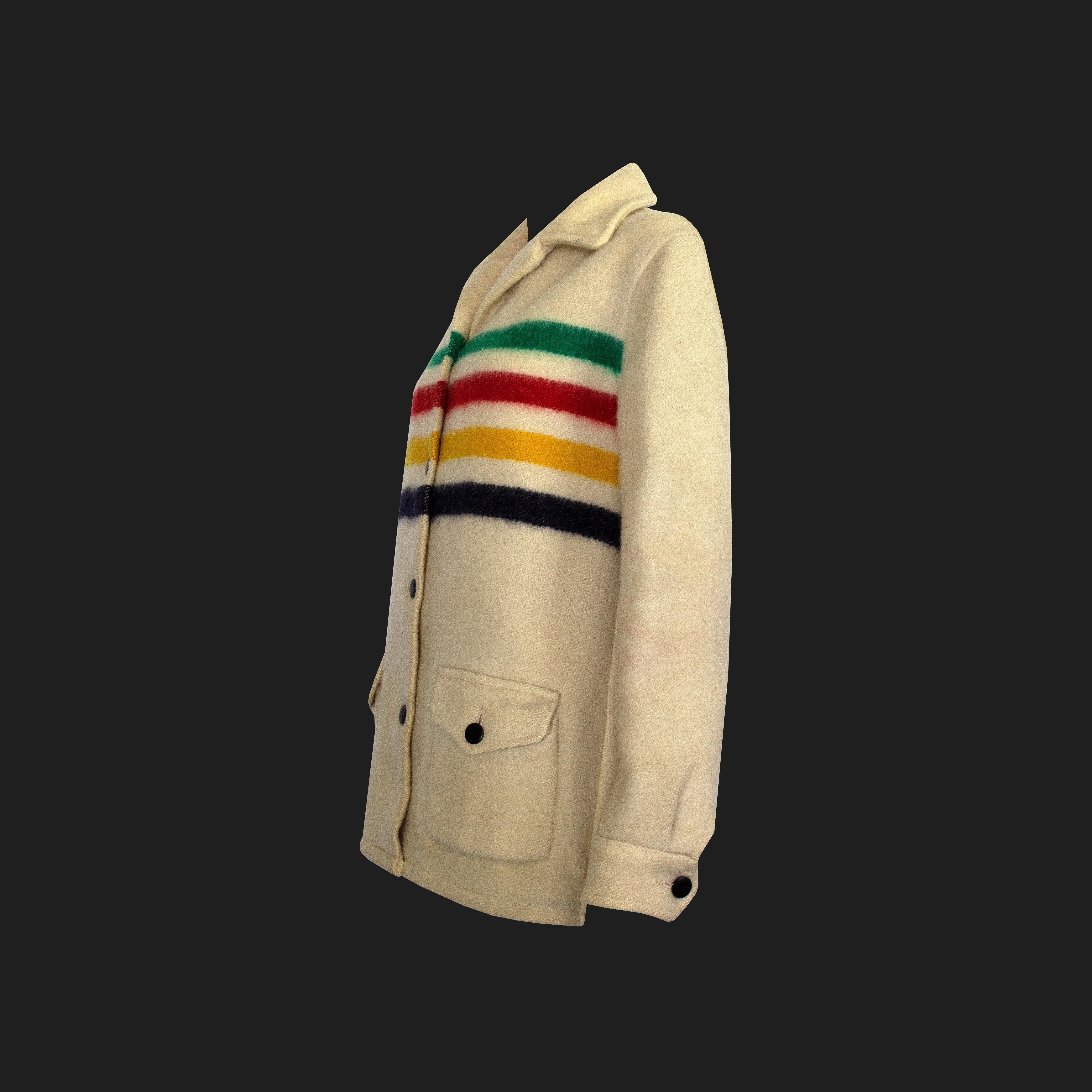 Product Details: Hudson’s Bay - RARE 1960s Vintage - 100% Wool - Made in Canada - Two-Way Collar - x 2 Front Pockets + Button Fasten - Button Closure Cuff + Front Jacket - Red, Green, Yellow + Navy Striped Detailing 
Label: Hudson’s Bay
Era: 1950s