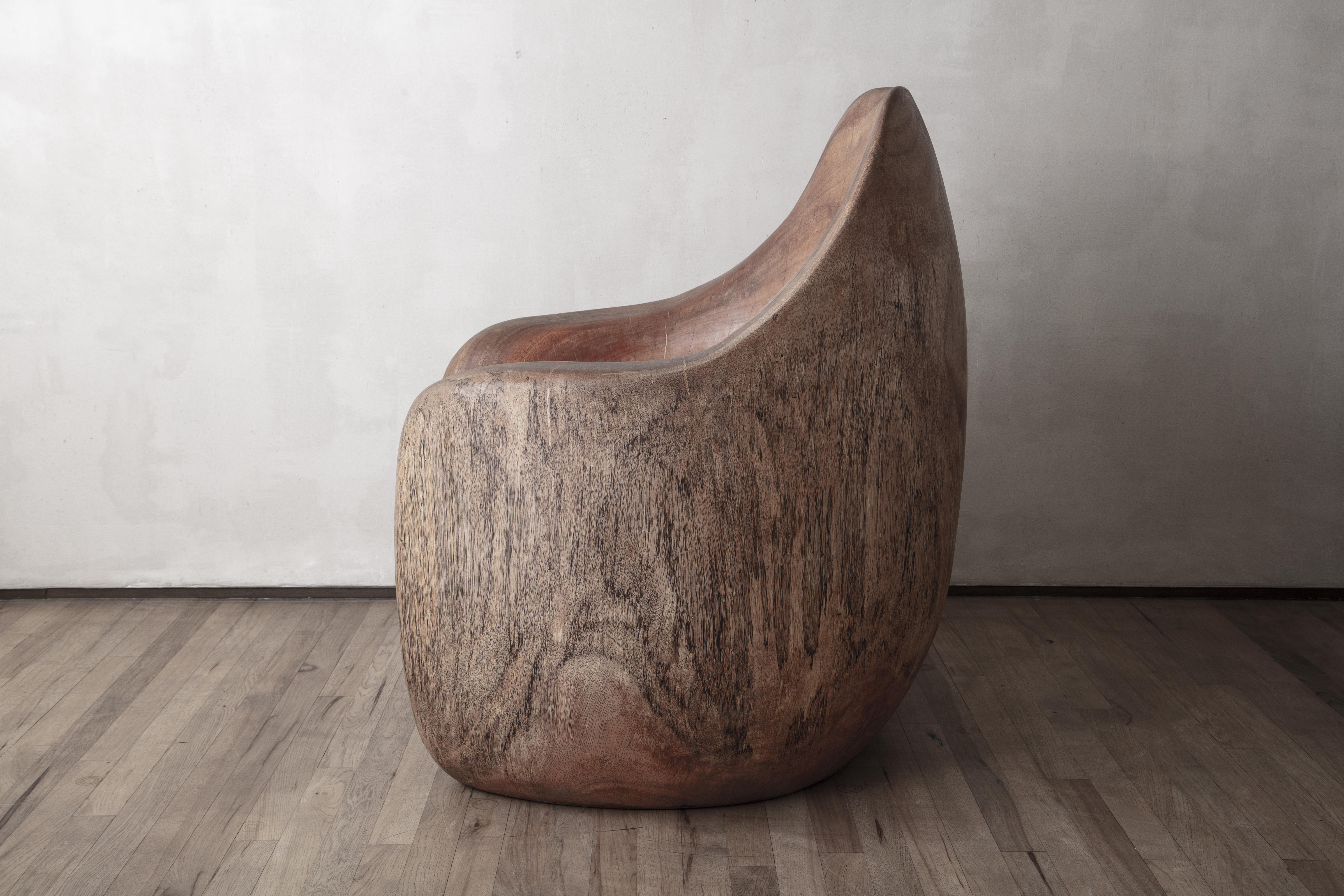 One of two unique sculpted chairs hand carved by the artist in antique Albizia Rosa wood from the Seychelles. Each is delivered with a signed certificate of authenticities. 

Each of Mauro Mori's pieces is sculpted and carved from solid blocks of