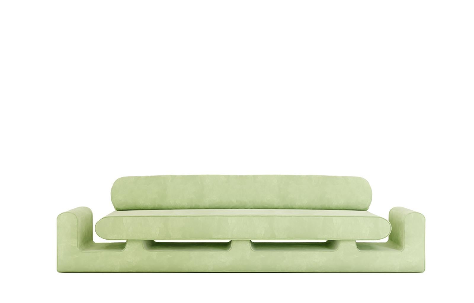 Hug green sofa by Rejo Studio.
Dimensions: D 315 x W 95 x H 76 cm.
Materials: wooden structure, with velvet.
Also available in different colours. 

Long comfortable hug. The hug sofa features two welcoming chubby arms and a magical handy space
