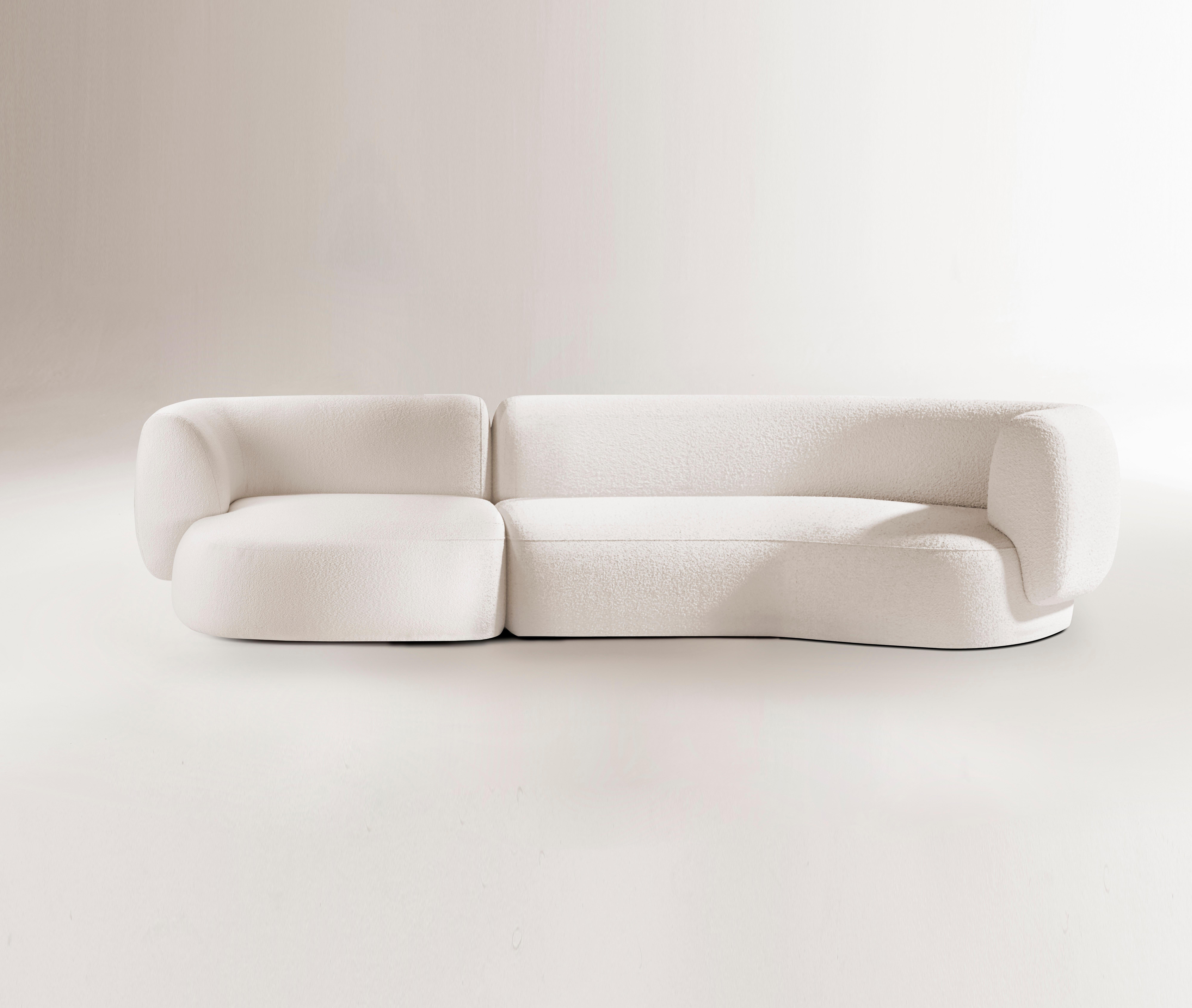 Hug modular sofa by Collector
Dimensions: W 320 x D 98 x H 74 cm.
35º Element module: W 200 x D 98 x H 74 cm.
DX terminal element module: W 120 x D 98 x H 74 cm.
Materials: Fabric, solid oak wood.

This sofa is composed of one DX Terminal