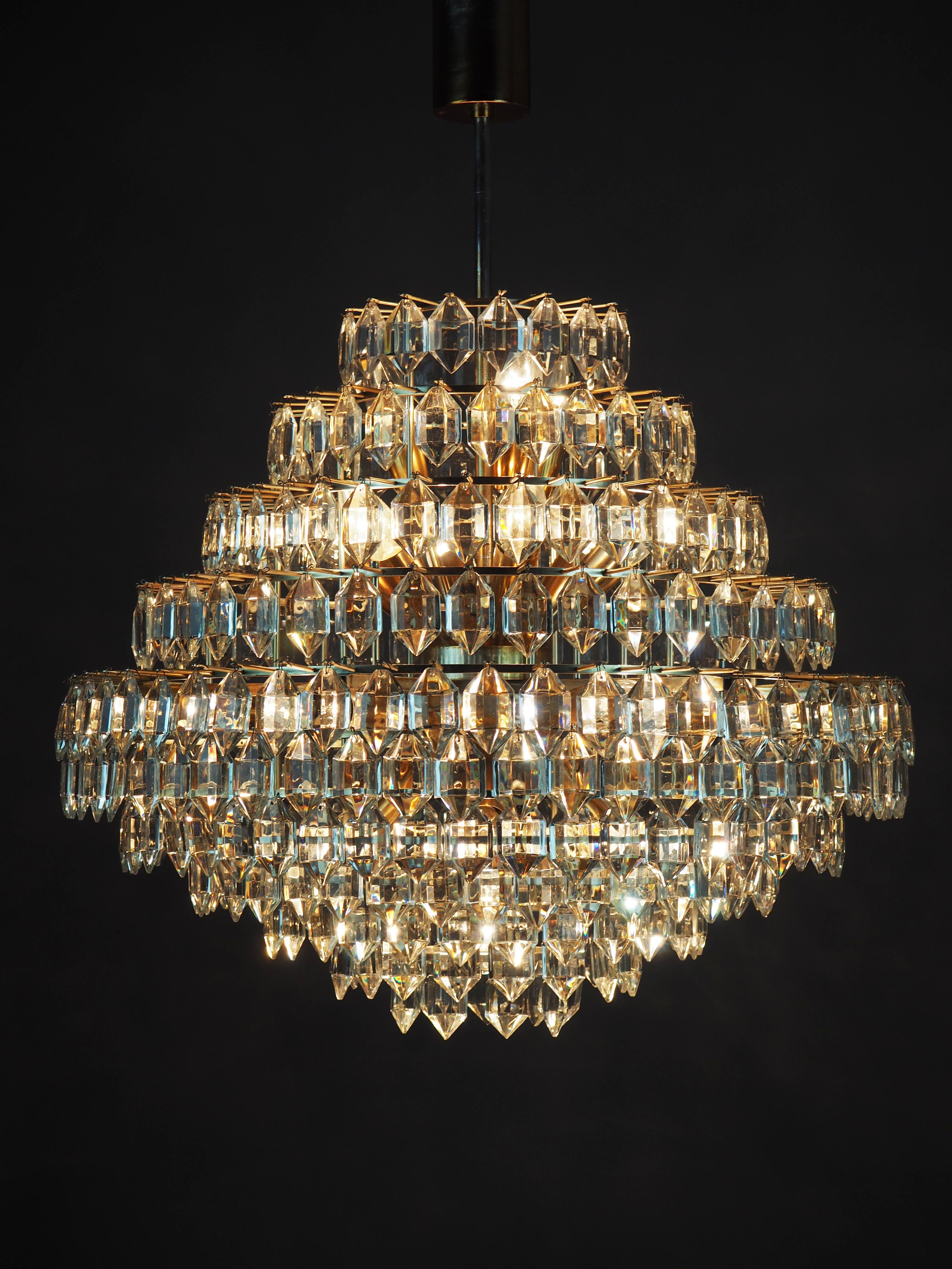 Exceptional and stunning mid century twenty two - light glass and silvered and plated brass chandelier by Bakalowits & Soehne, Austria, circa 1960s.

Socket: 21 x e14 and 1 x e27 for standard screw bulbs.

Very good original condition.