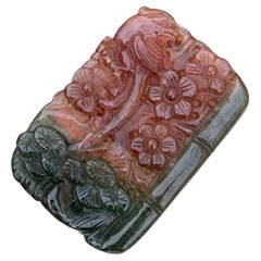 Grande tourmaline naturelle bicolore sculptée au goutte d'eau 112 carats 