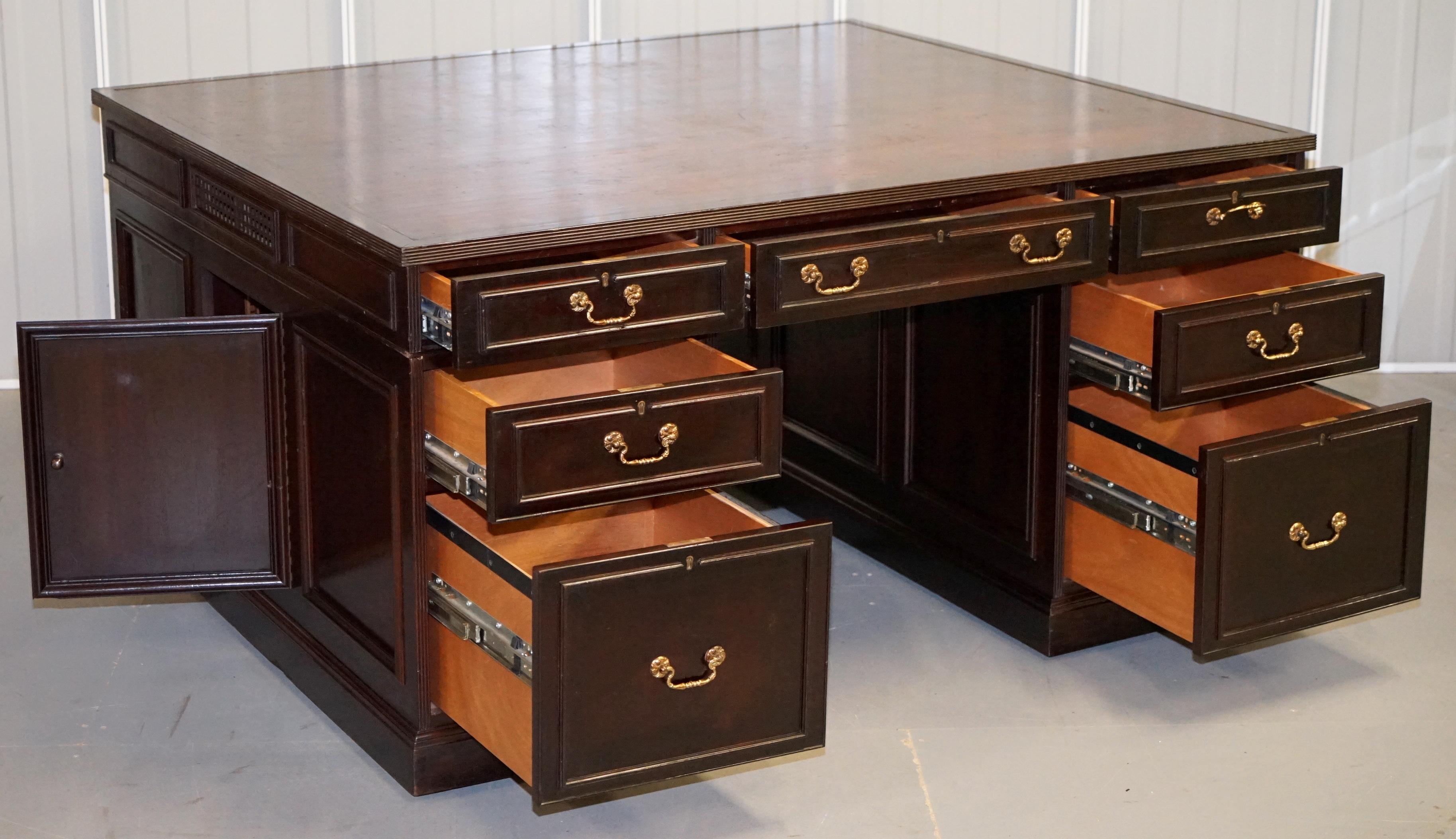 We are delighted to offer for sale this monumental solid hardwood 14-drawer two bookshelf twin pedestal partner desk

This desk is large and in charge, its naturally designed for two “Partners” to share, the style dates back to the old legal desks