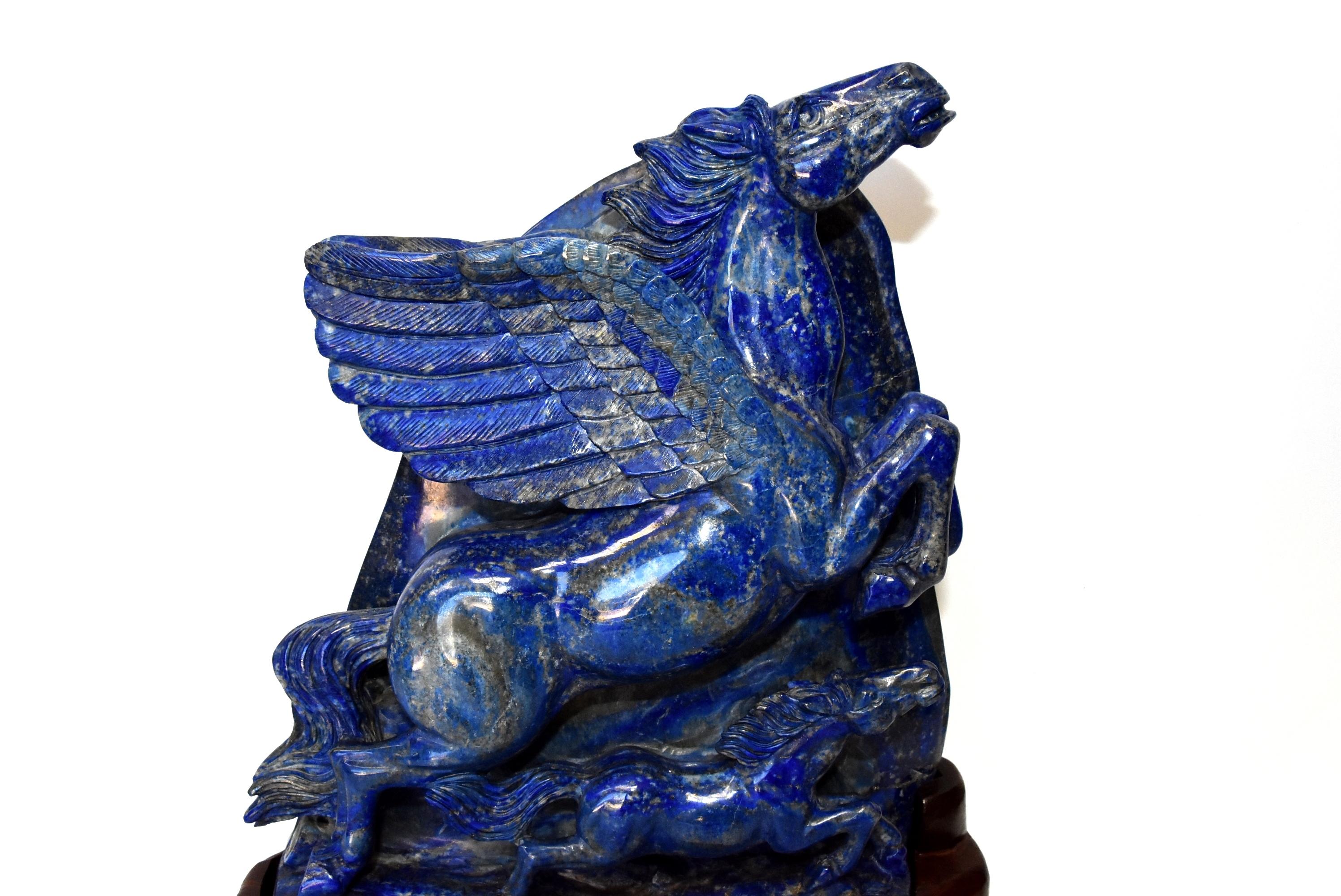 This is an extra large, splendid sculpture featuring a pair of mother and child horses. Measuring at 12