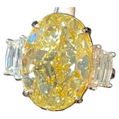 Huge 15.02 Carat Fancy Yellow Oval Shaped Brilliant Cut 3 Stone Diamond Ring