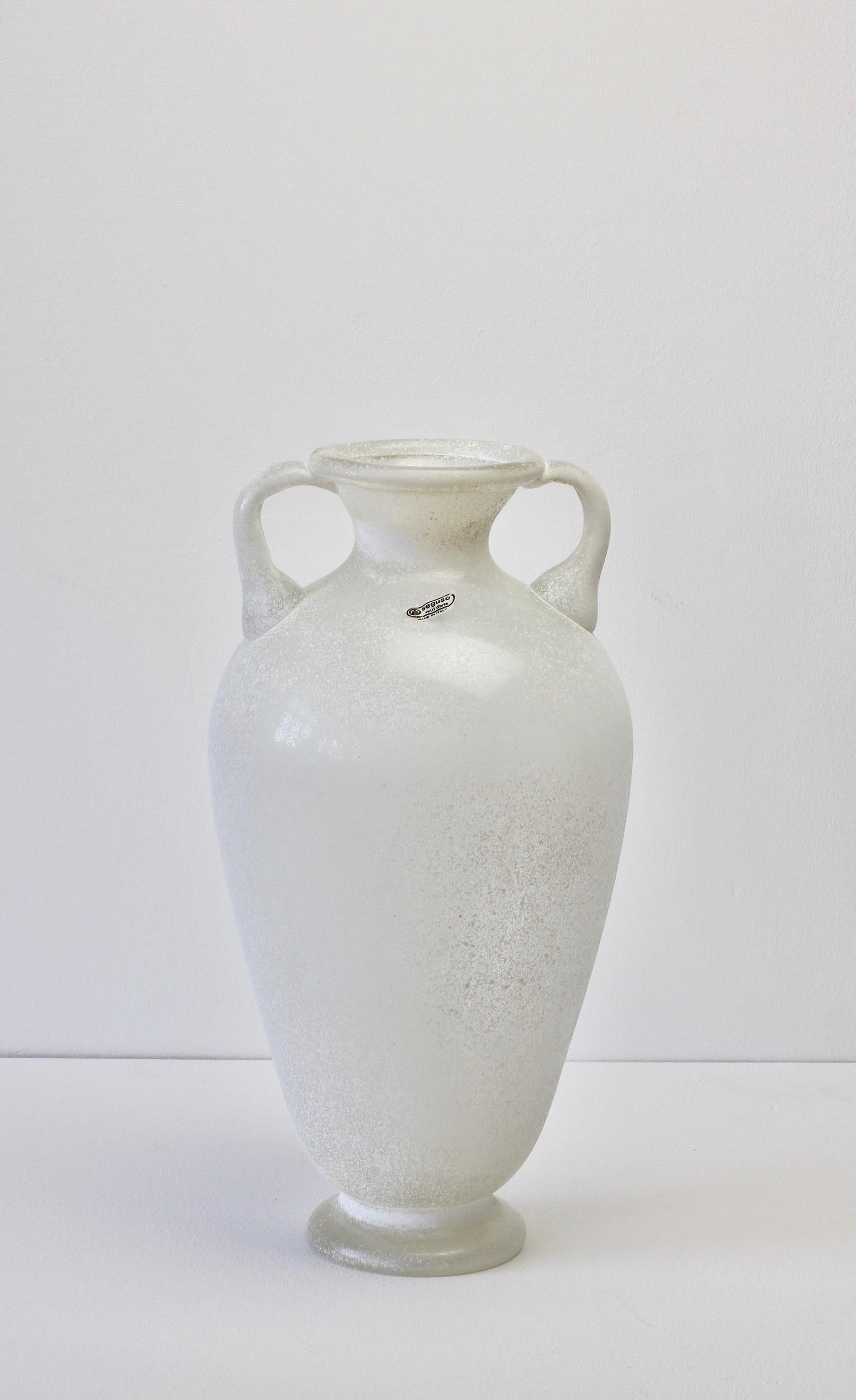 Monumental, large and elegant vintage Italian 16 inch tall 'a Scavo' white colored / colored glass Amphora or vase signed/engraved by Seguso Vetri d'Arte Murano, Italy. Elegant in form and showing extraordinary craftsmanship with the use of the
