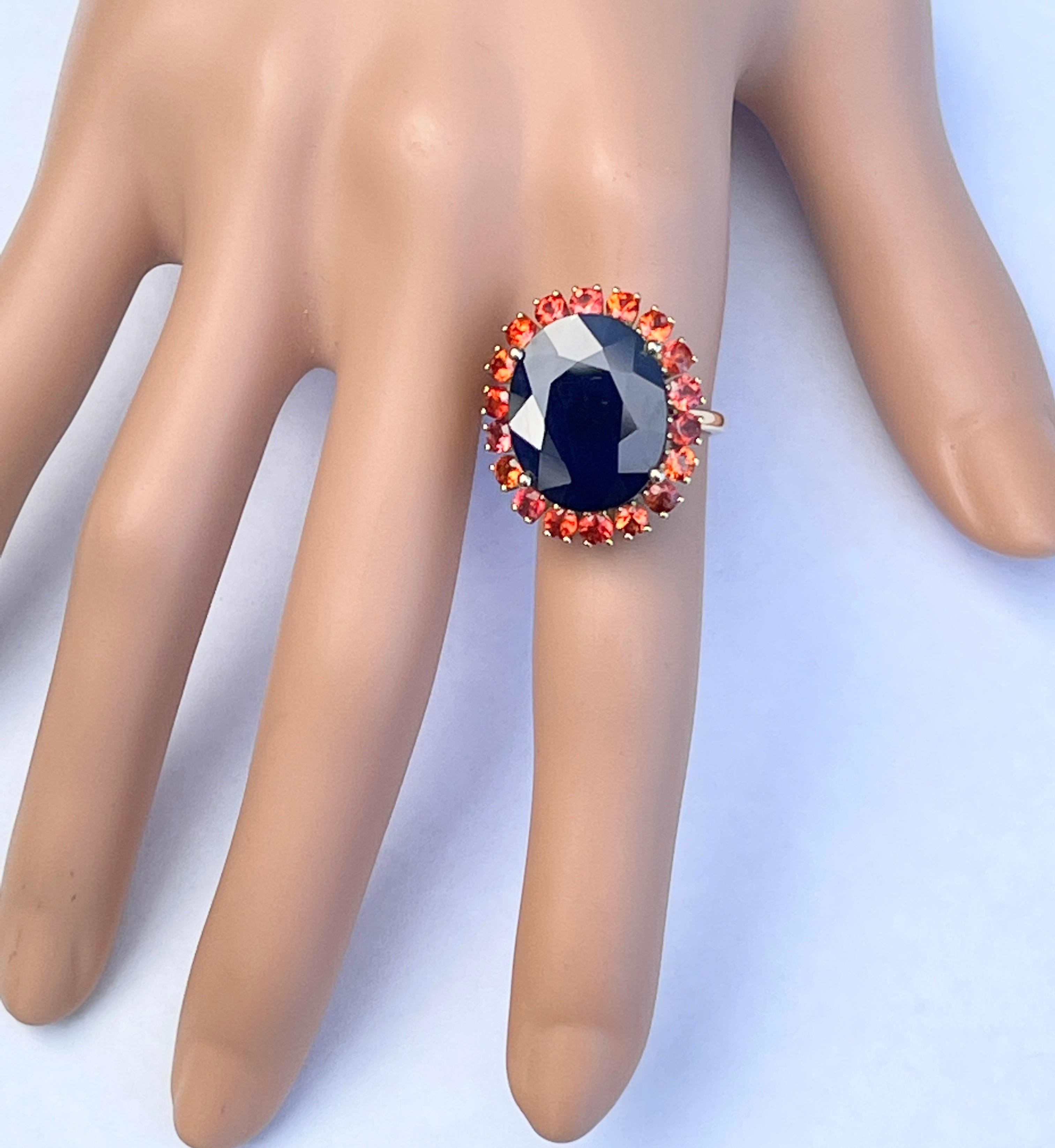 Huge 16ct Natural Blue Sapphire with Orange Sapphire Halo Ring 10ct Yellow Gold For Sale 4