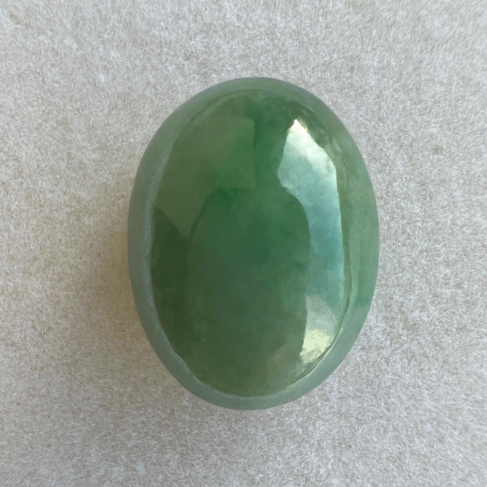 Huge 17.57Ct GIA Certified Green Jadeite Jade ‘A’ Grade Oval Cabochon Rare Gem

Huge GIA Certified Untreated Green Jadeite Gemstone.
17.57 Carat beautiful untreated jadeite stone with a mottled green colour and an excellent oval cabochon cut. Fully
