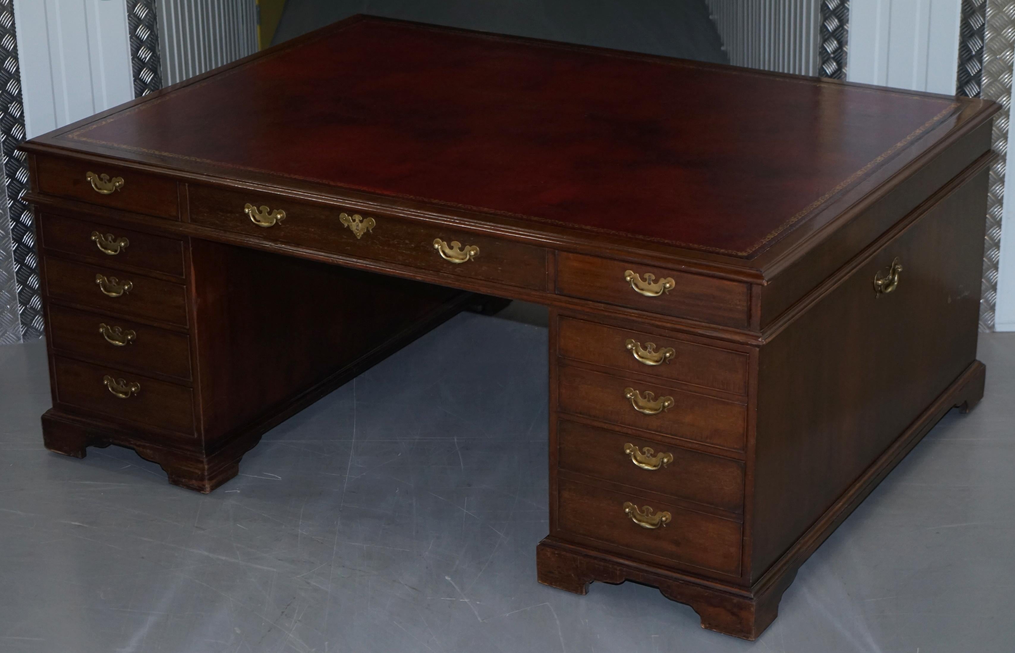 We are delighted to offer for sale this huge Victorian twin pedestal 18-drawer double sided mahogany partner desk with oxblood leather top

This desk is monumental, originally designed as you can see for two people to share, the depth of this desk