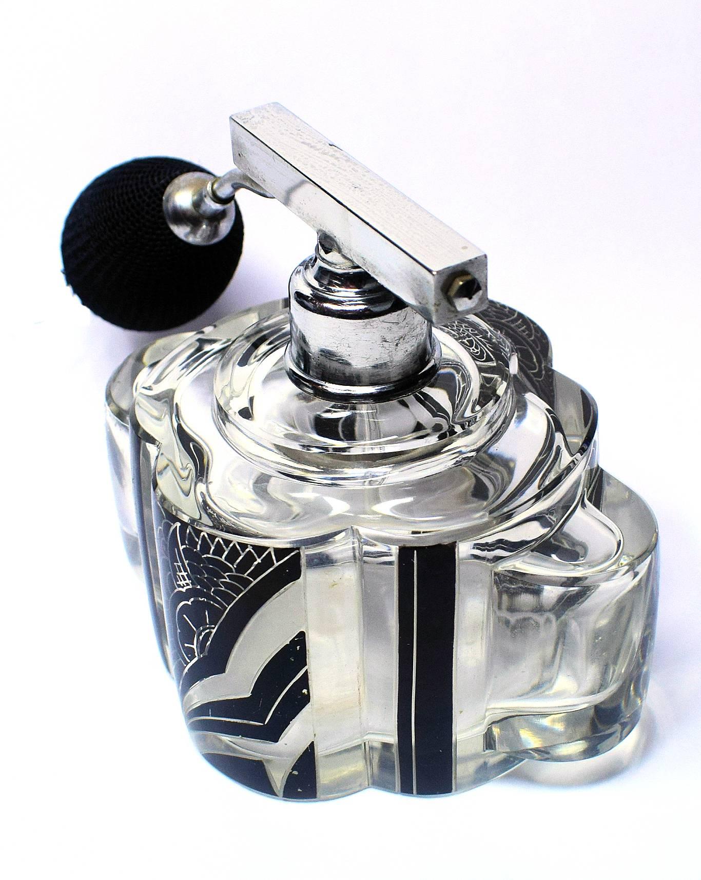 This rare scent bottle is an absolute delight, one can't be distracted away from it's actual size, it's at least twice the size of the normal Czech Karl Palda perfume bottles that one normally finds. The black enamel decoration is in excellent