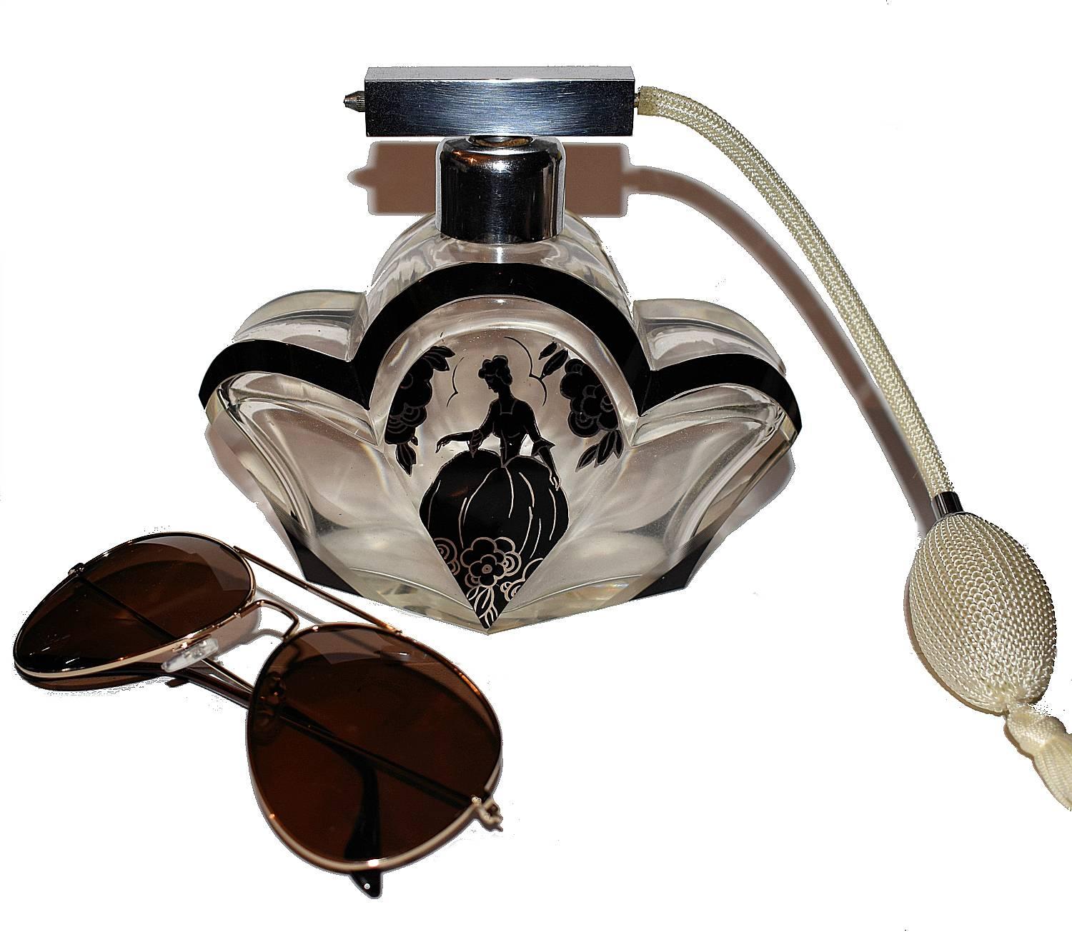 This rare scent bottle is an absolute delight, one can't be distracted away from it's actual size, it's at least twice the size of the normal Czech Karl Palda perfume bottles that one normally finds. The black enamel decoration is in excellent