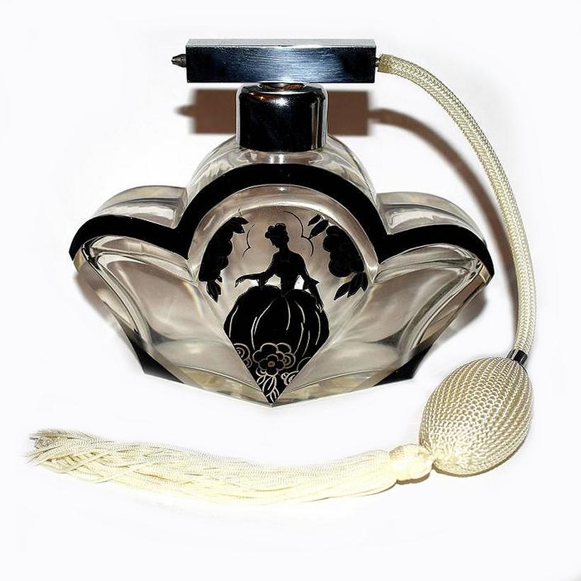This rare scent bottle is an absolute delight, one can't be distracted away from it's actual size, it's at least twice the size of the normal Czech Karl Palda perfume bottles that one normally finds. The black enamel decoration is in excellent