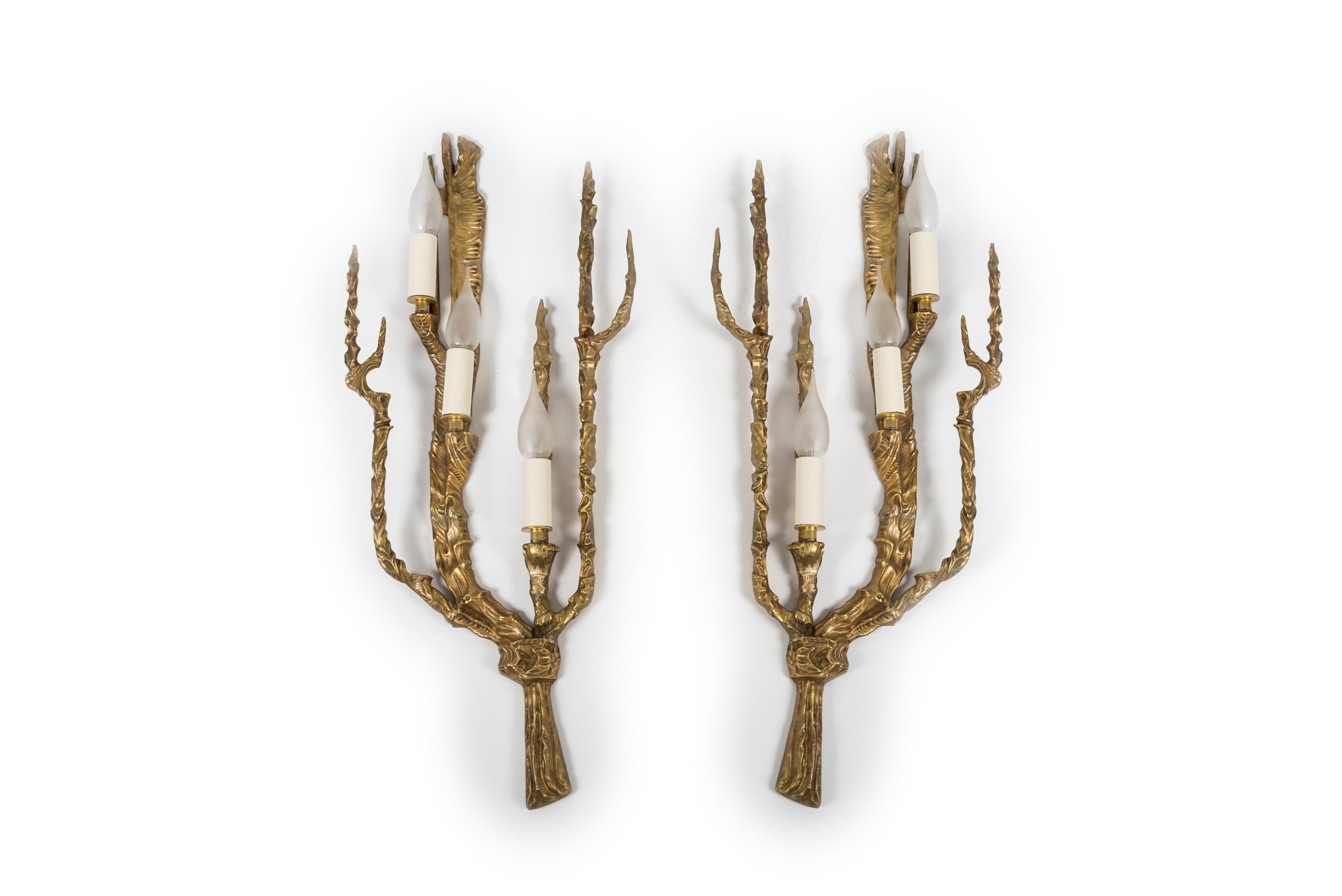 Rare pair of tall bronze sconces in the style of Felix Agostini.
France
1950's
Re-wired.