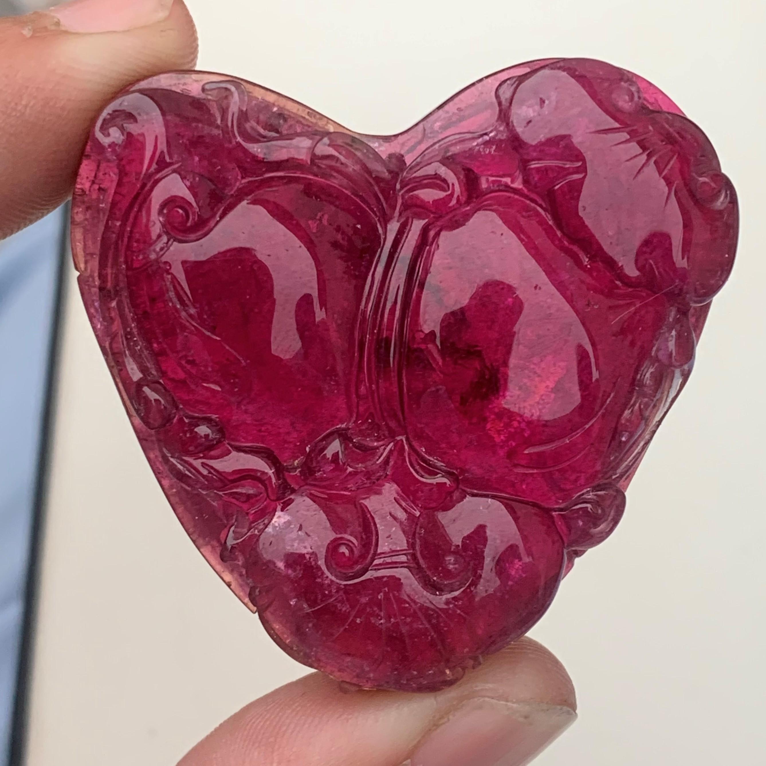 Gemstone Type :  Rubellite Tourmaline
Weight : 197.45 Carats
Dimensions : 45x45x11 Mm
Origin : Africa 
Clarity :  SI
Shape: Heart 
Color: Pink Red
Certificate: On Demand
The rubellite is a transparent gemstone from the colorful family of the