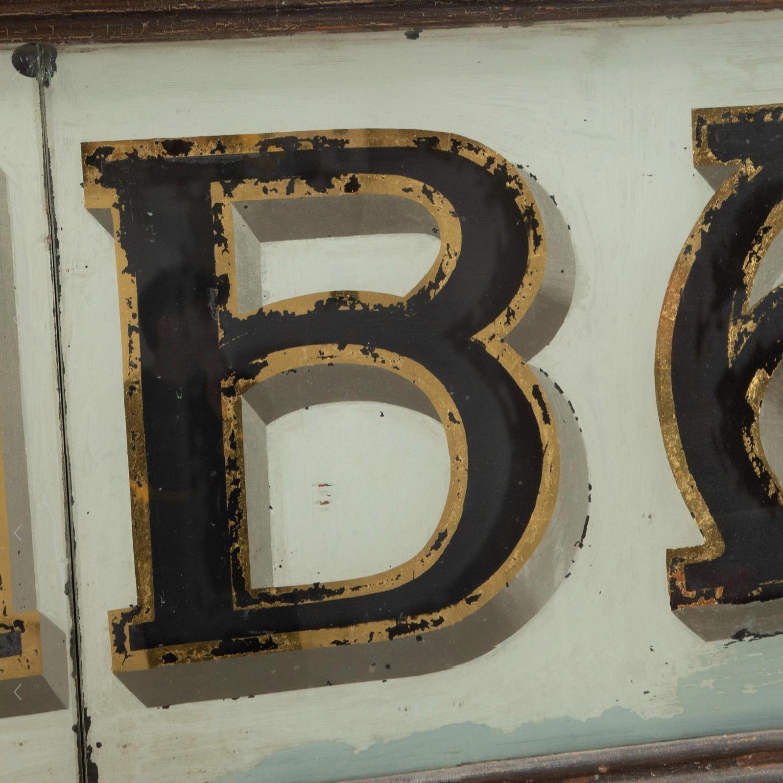 Spanish Huge 19th Century Gilded and Reverse Painted Shop Sign For Sale