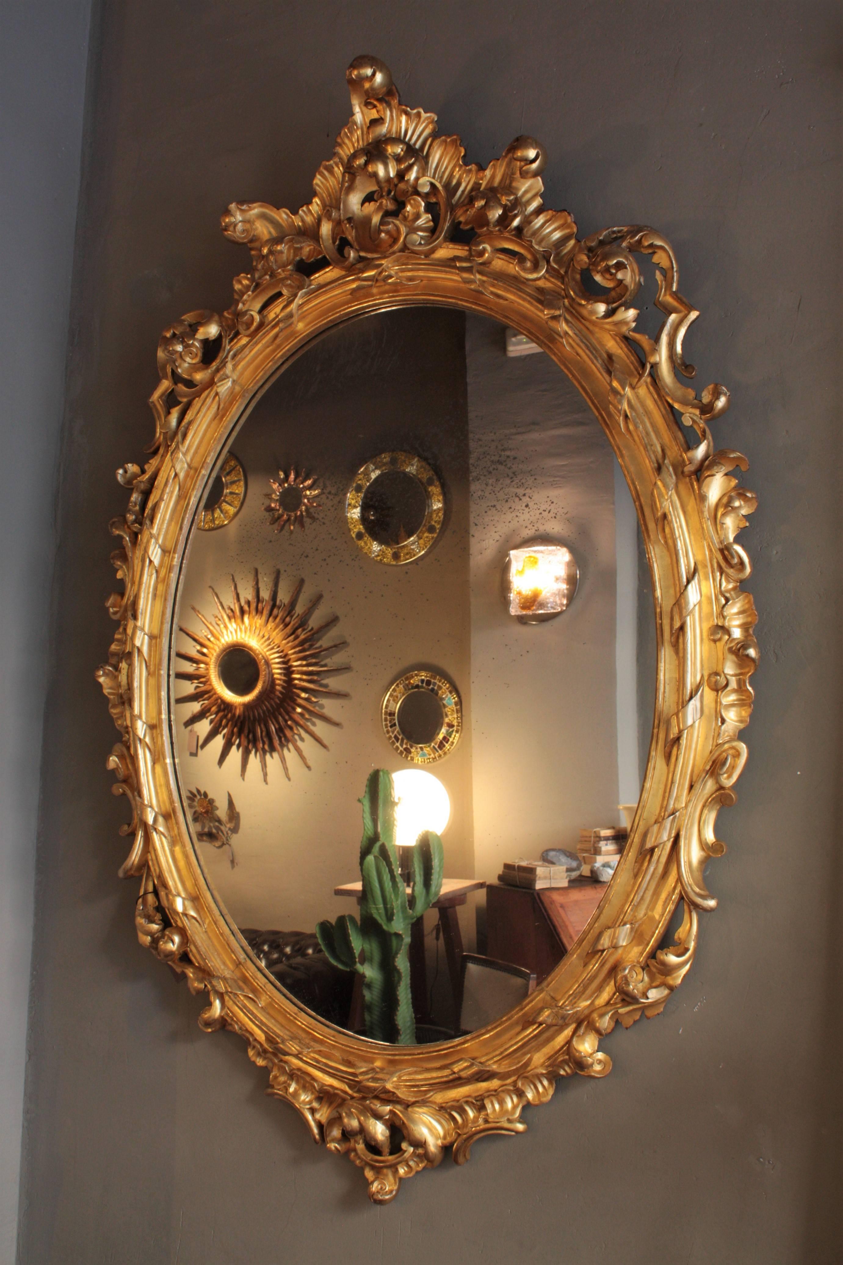 Hand-Carved French Rococo Carved Giltwood Palatial Oval Mirror For Sale