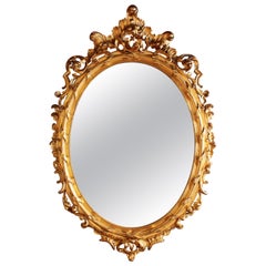 French Rococo Carved Giltwood Palatial Oval Mirror