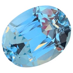 Grande topaze bleu clair non sertie de 22,10 carats de forme ovale pour collier 