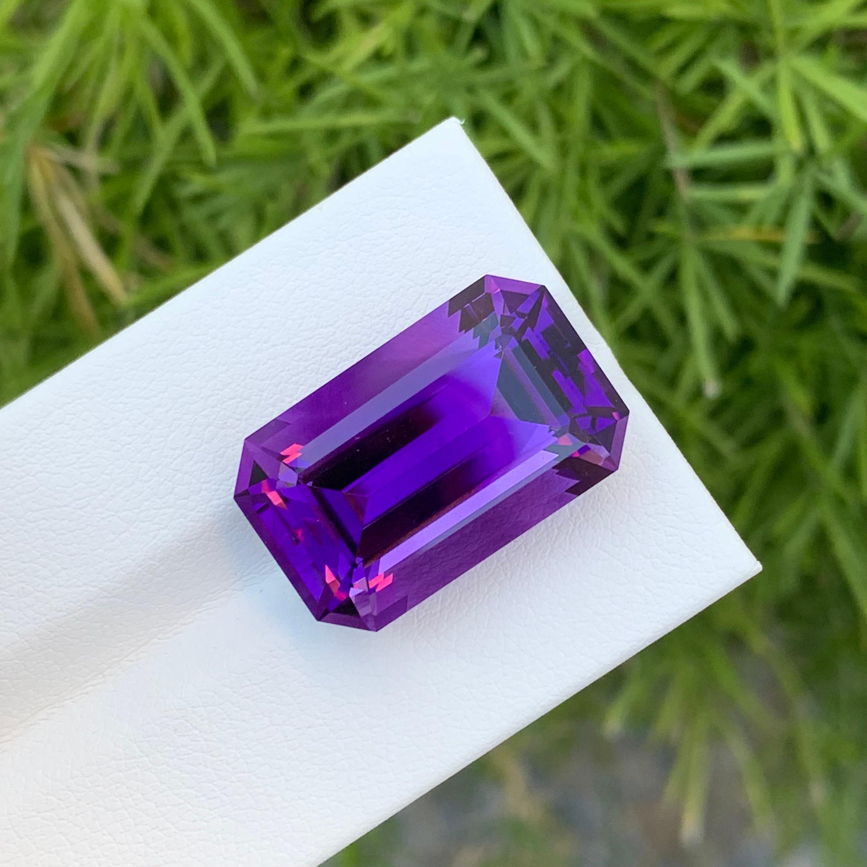 Loose Amethyst
Weight: 23.50 Carats
Dimension: 22 x 13.8 x 11 Mm
Colour: Purple
Origin: Brazil
Treatment: Non
Certificate: On Demand
Shape: Emerald 

Amethyst, a stunning variety of quartz known for its mesmerizing purple hue, has captivated humans