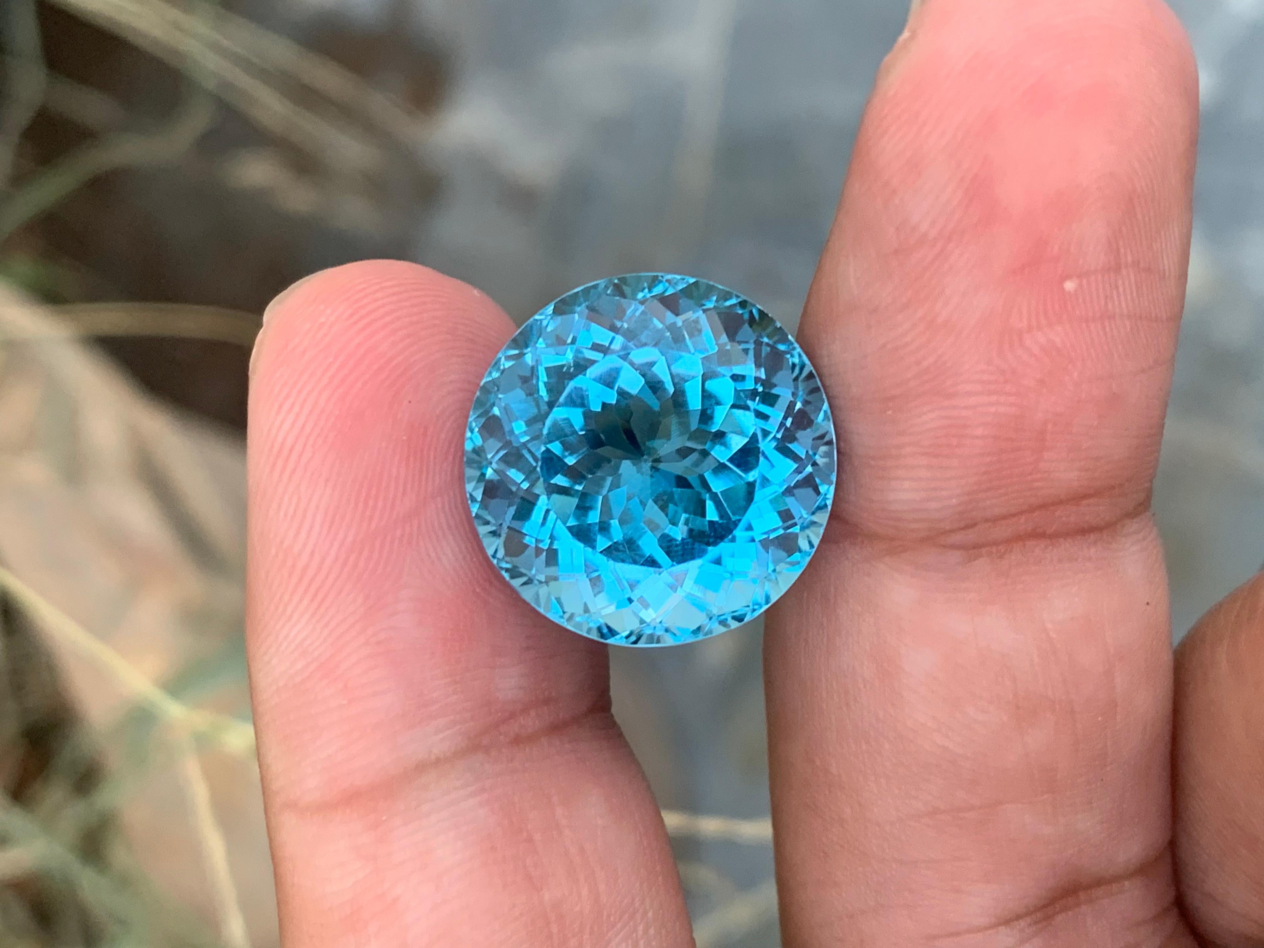Faceted Blue Topaz 
Weight: 25.70 Carats 
Dimensions: 17.1x17.1x11.8 Mm
Origin: Brazil
Color: Blue
Shape: Round 
Certificate: On Customer Demand 
.
Blue topaz is a popular gemstone known for its beautiful blue color and is often associated with