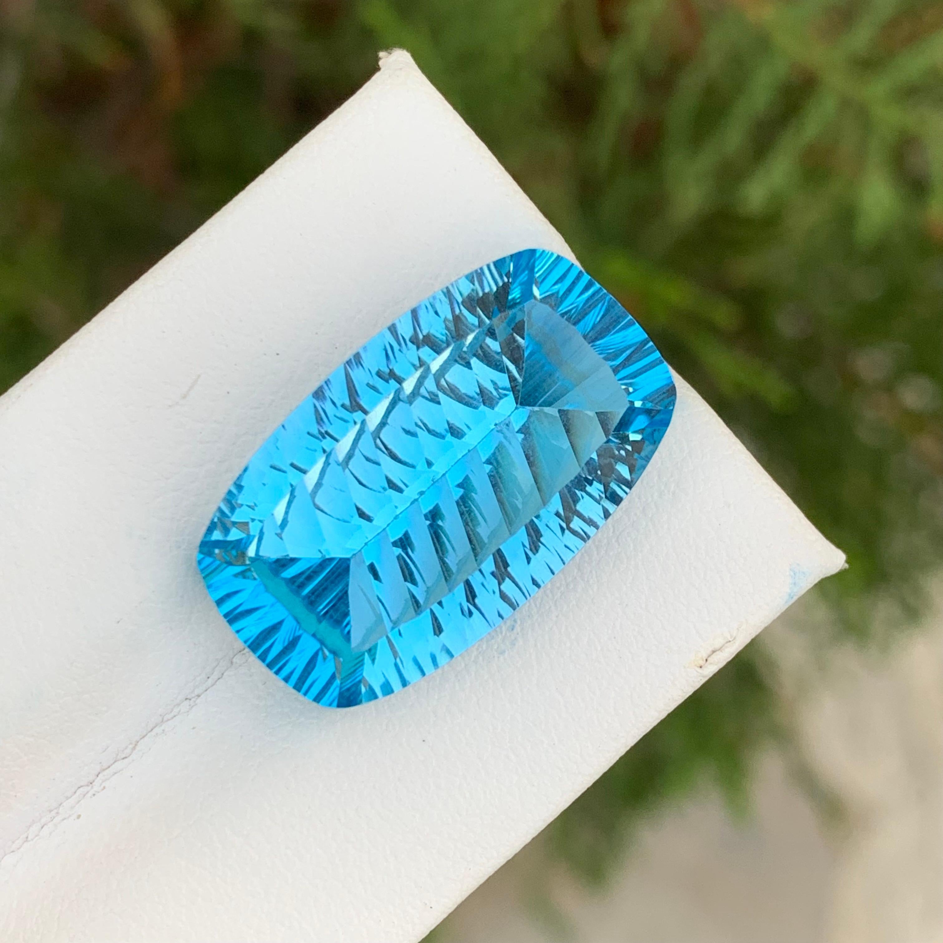 Faceted Natural Blue Topaz
Weight: 28.25 Carats 
Dimension: 24x14.5x9.1 Mm
Origin: Brazil
Shape: Oval
Cut/Facet: Laser Cut
Certificate: On Customer Demand 
Blue topaz is a stunning and popular gemstone known for its striking blue hues. It's a member