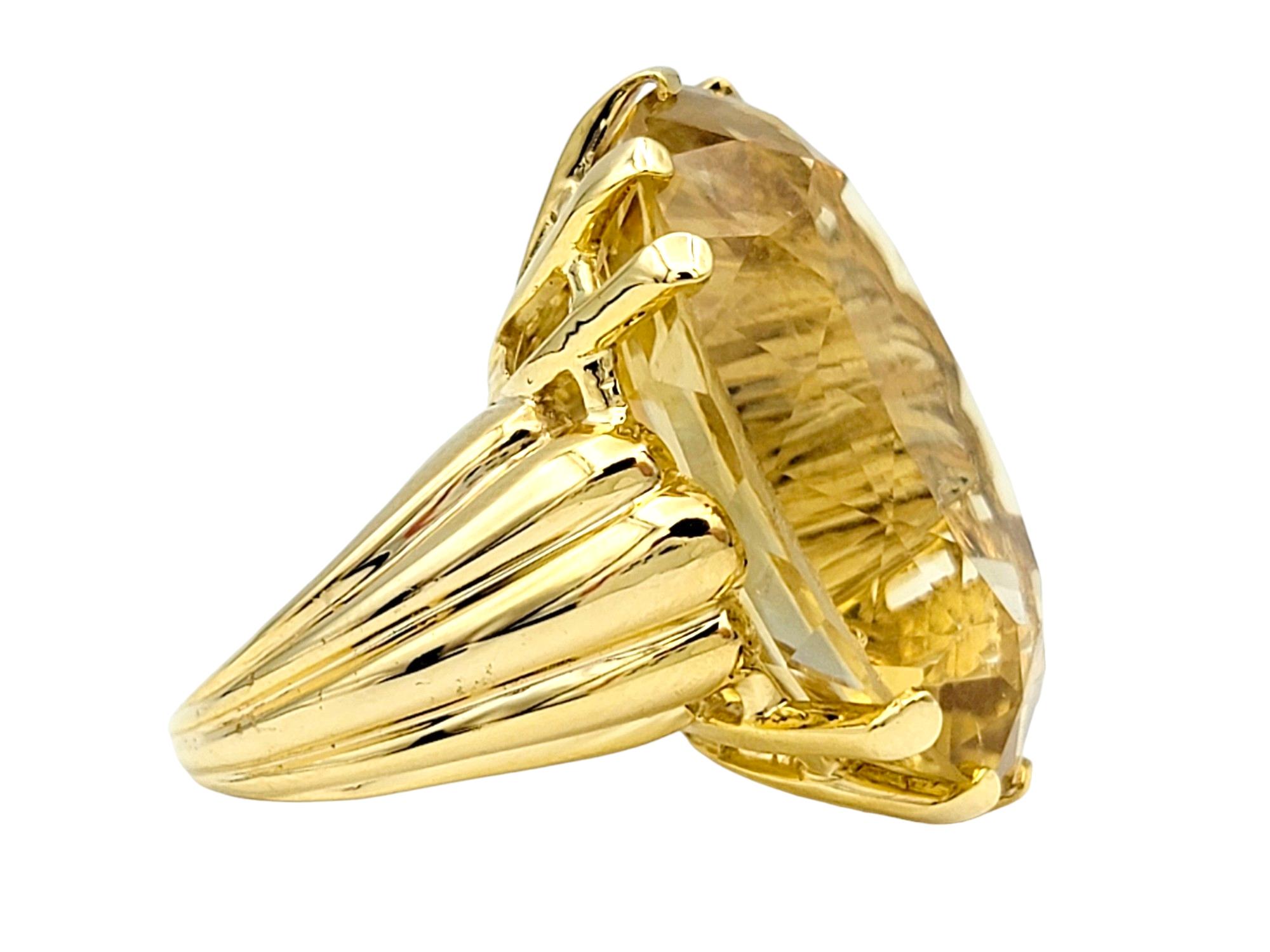 Contemporary Huge 29.25 Carat Oval Citrine Solitaire Cocktail Ring in 14 Karat Yellow Gold For Sale