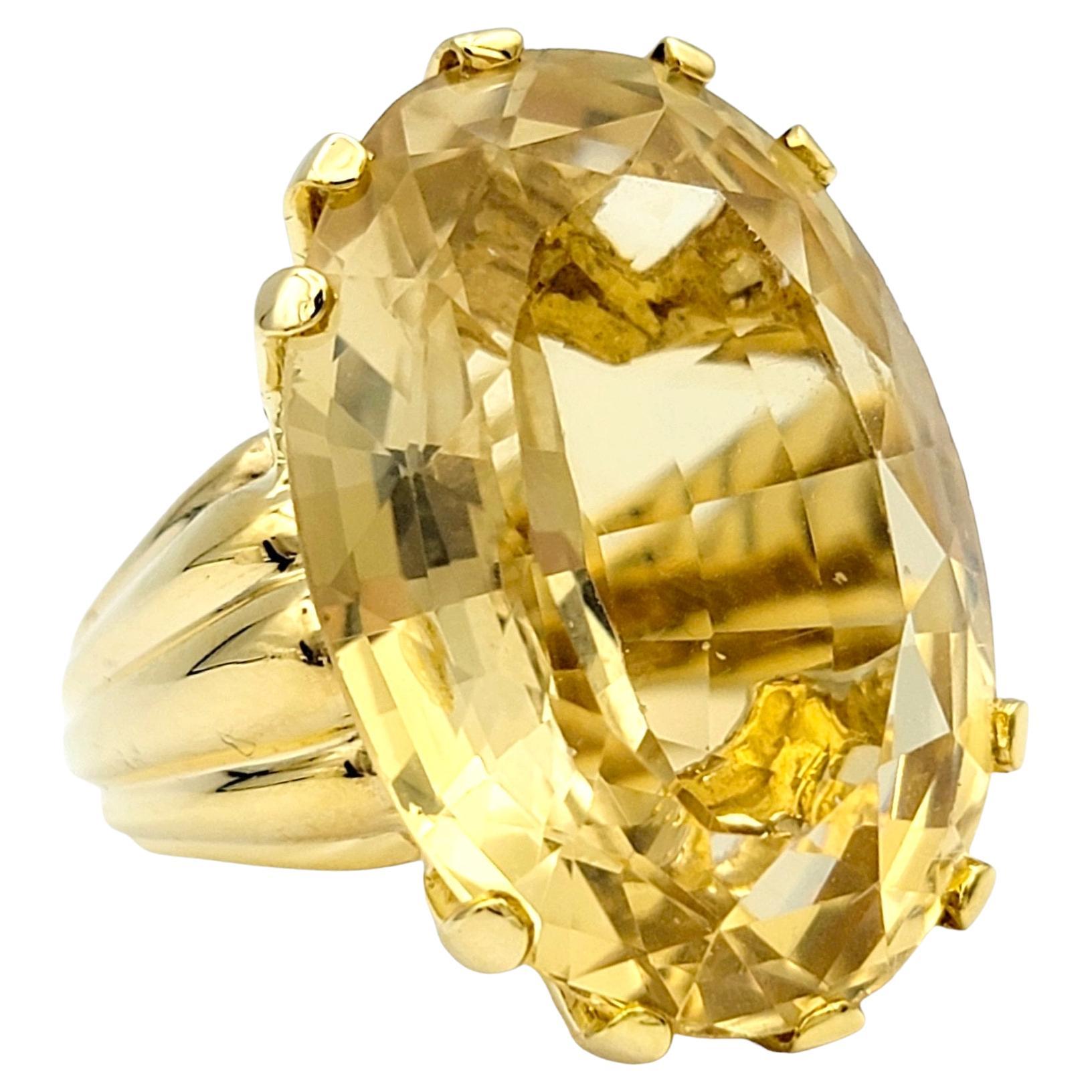 Huge 29.25 Carat Oval Citrine Solitaire Cocktail Ring in 14 Karat Yellow Gold For Sale