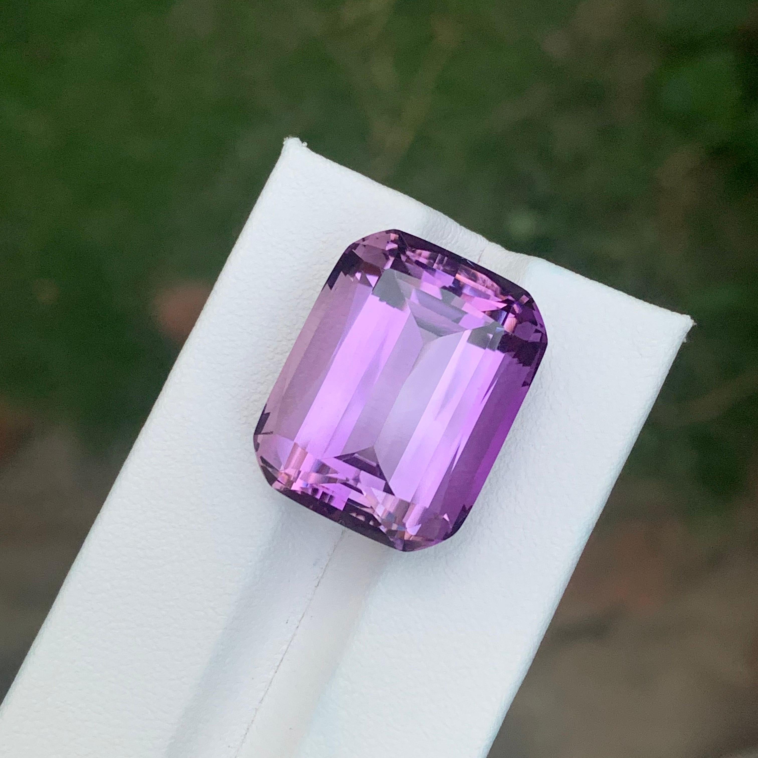 Stone: Amethyst

Weight : 31.00 Carats
Dimension: 21 x 16.8 x 12.1 Mm
Origin: Brazil
Shape: Emerald
Color: Purple
Treatment: Non
Certificate: On Customer Demand

Amethyst, a stunning violet variety of quartz, is known not only for its beauty but