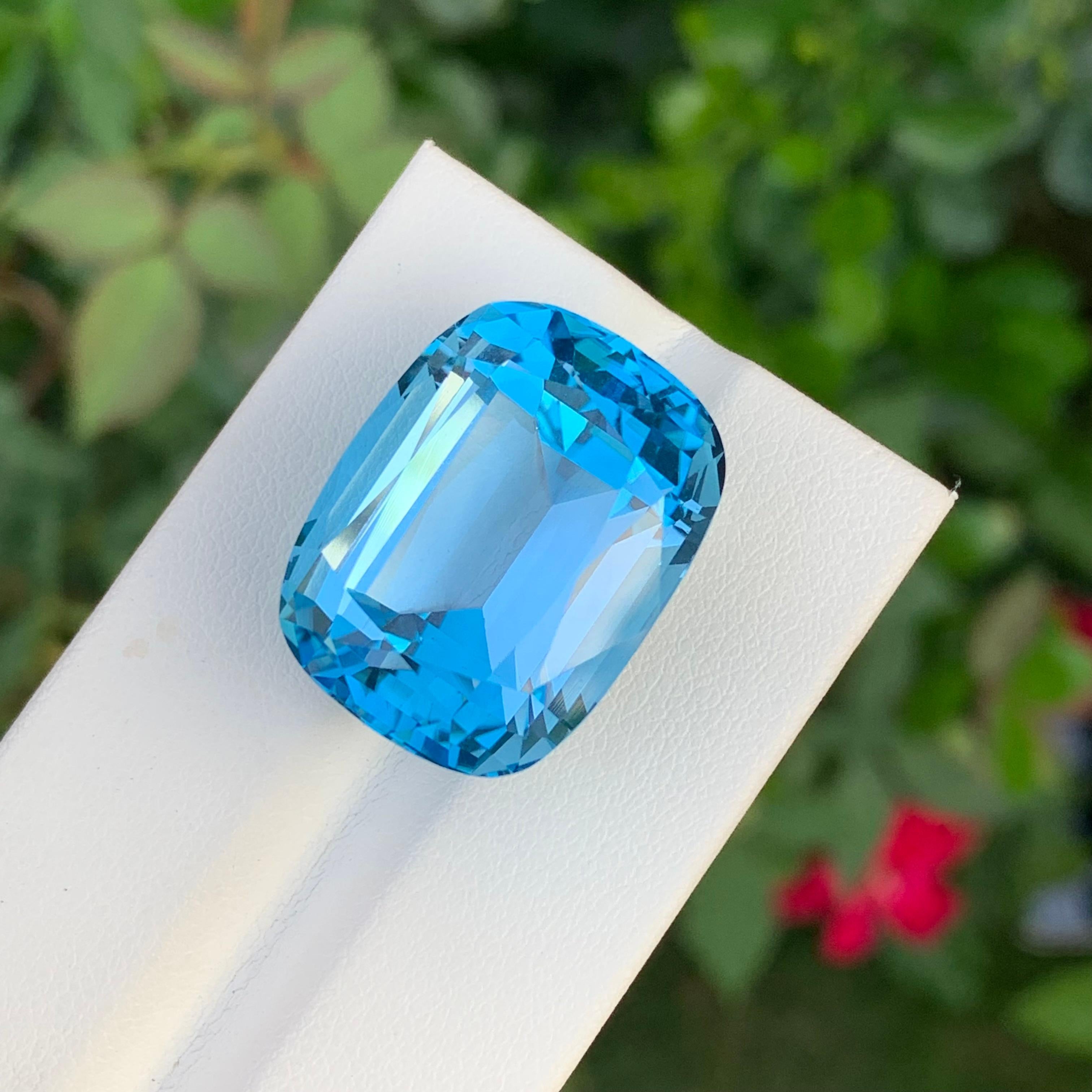 Faceted Swiss Blue Topaz

Weight: 50 Carats
Dimension: 22 x 17 x 14 Mm
Colour : Blue
Shape: Cushion
Origin: Brazil

Swiss blue topaz is a vibrant, light blue gemstone known for its striking clarity and brilliance. It is a variety of topaz, which is