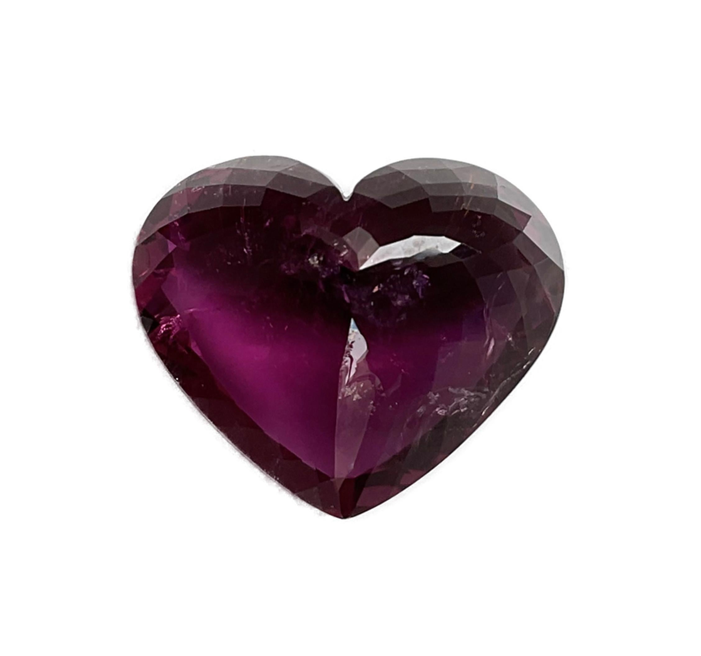 This Heart shape tourmaline can be called as Paraiba tourmaline as it contains both manganese and copper, can be heated to blue color but we prefer to sell it as it is in the natural state.