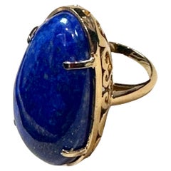 Grande bague en or jaune 14 carats avec lapis-lazuli cabochon naturel de 63 carats, ancienne propriété