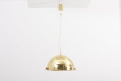 Énorme lampe suspendue réglable en laiton attribuée à Münchner Werkstätten:: Allemagne