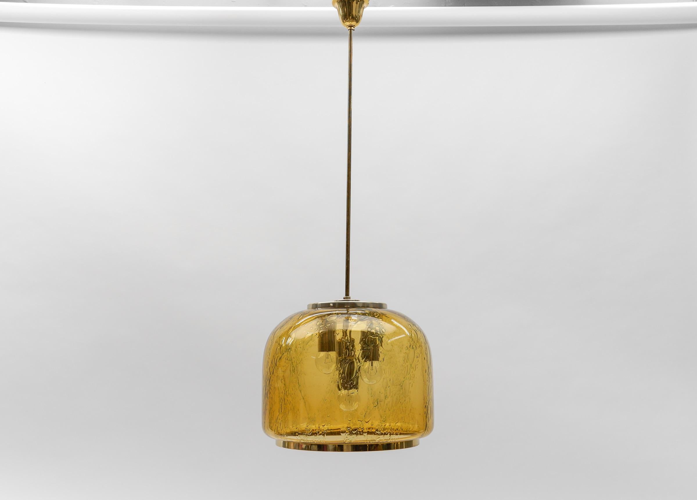 Elegant Smoked Glass Pendant Lamp by Limburg, Mid-Century Modern - Germany

Dimensions
Diameter: 14.96 in. (38 cm)
Height: 41.33 in. (105 cm)

One E27 socket. Works with 220V and 110V.

Our lamps are checked, cleaned and are suitable for use in the