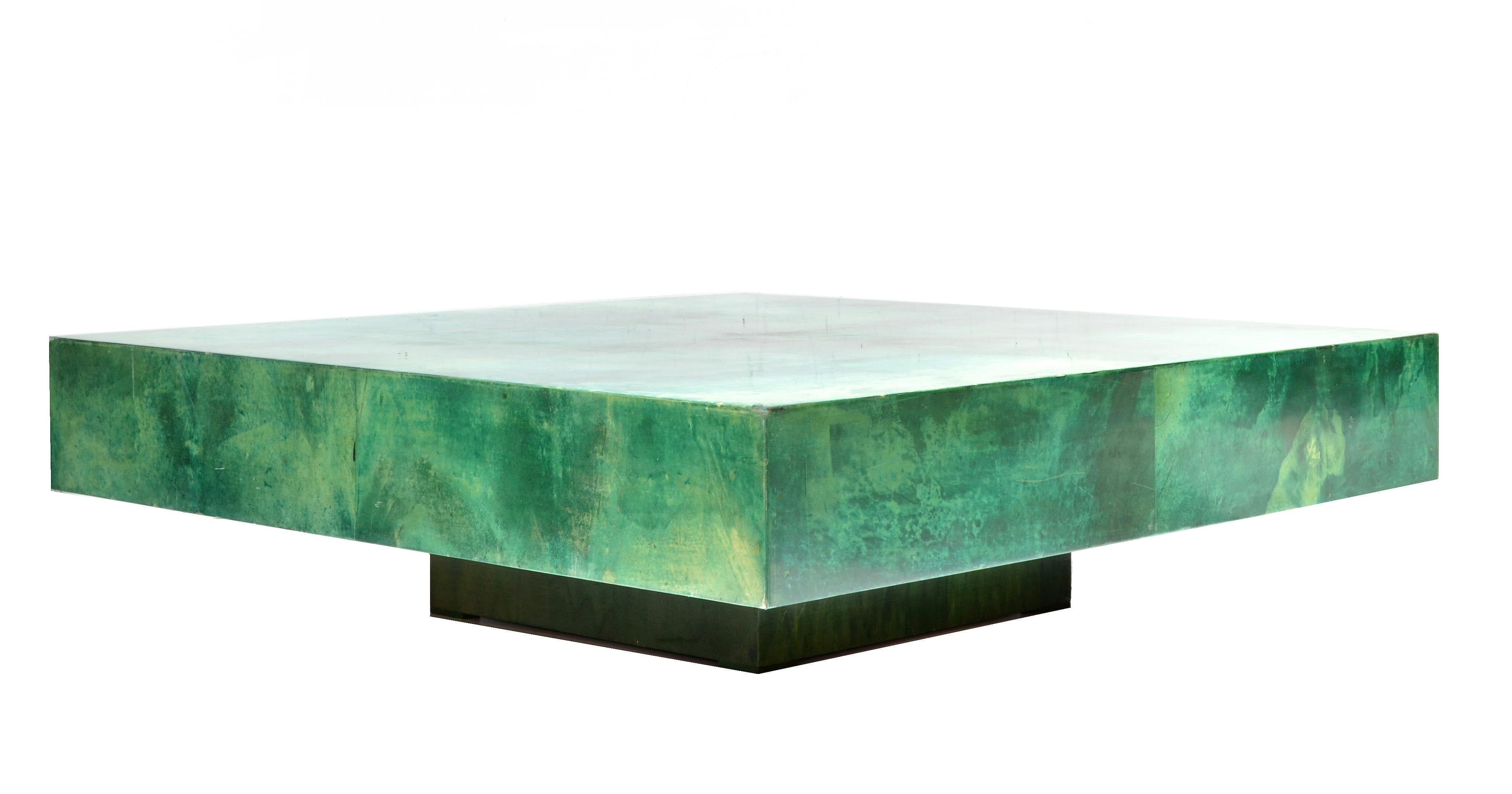 This is an original Aldo Tura square large coffee or cocktail table in Emerald green goatskin.
The top is lacquered to keep the long lasting beauty.
Mid-Century Modern Craftsmanship with the ability to last many decades.